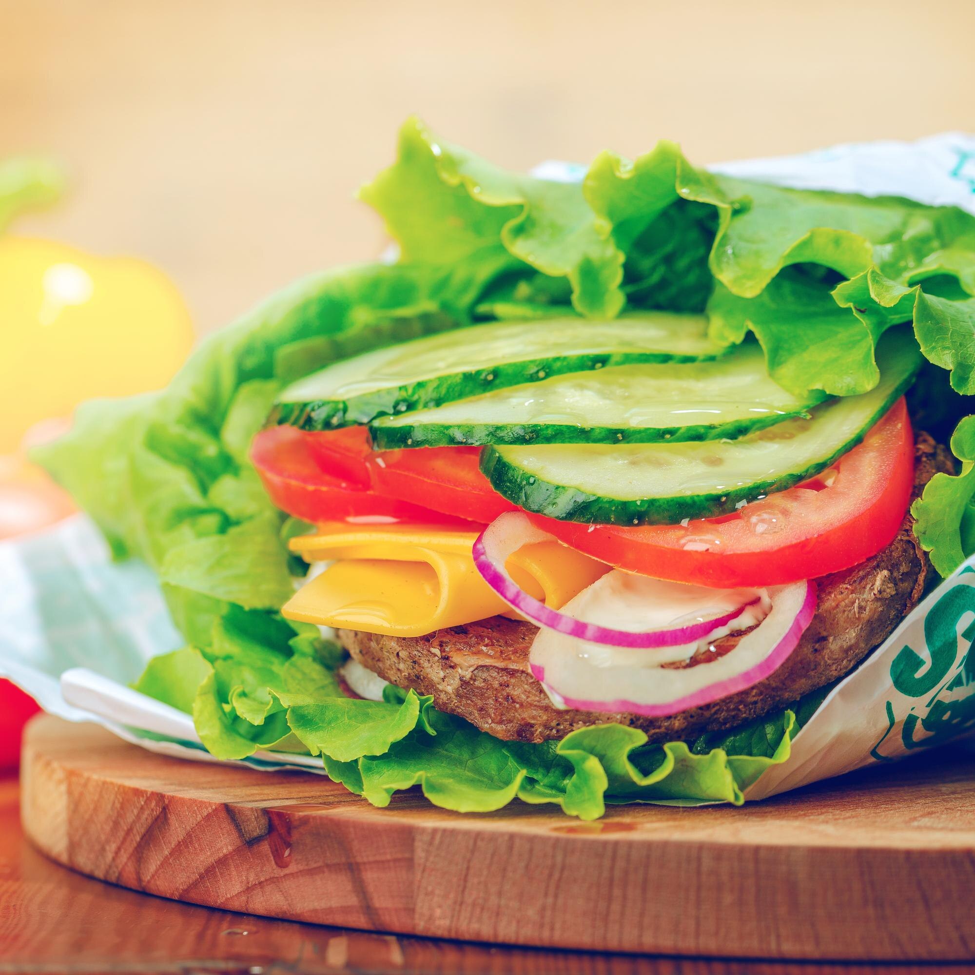 Why Settle for Boring? Dive into Fresh, Flavorful Fast Food Handcrafted with Care! 2 fresh and colorful vegetable and cheese wrap prepa 47900ac416bfb2538bdb