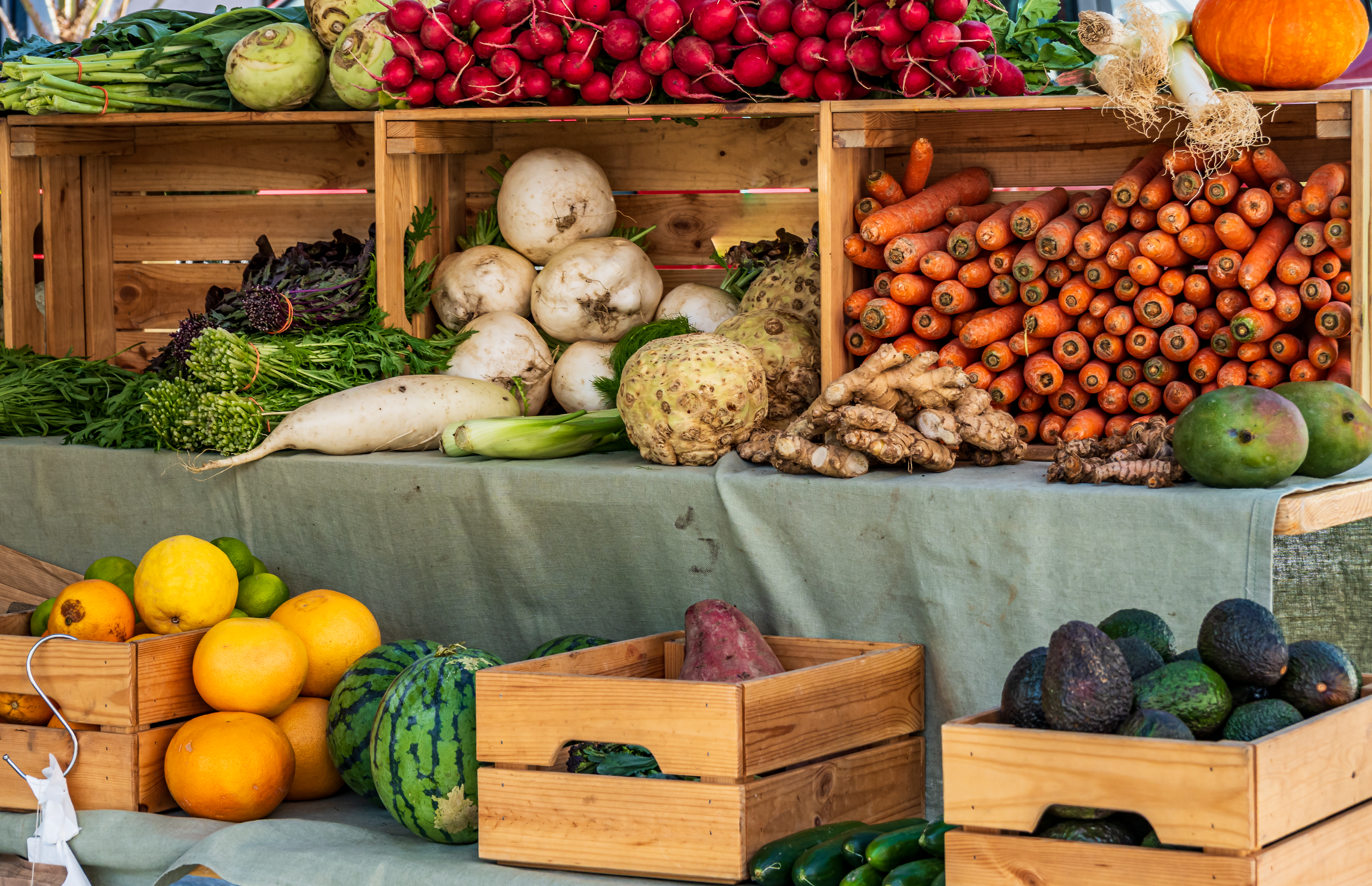 fresh produce displayed at a bustling outdoor mark cd67b533bde7759c97e8