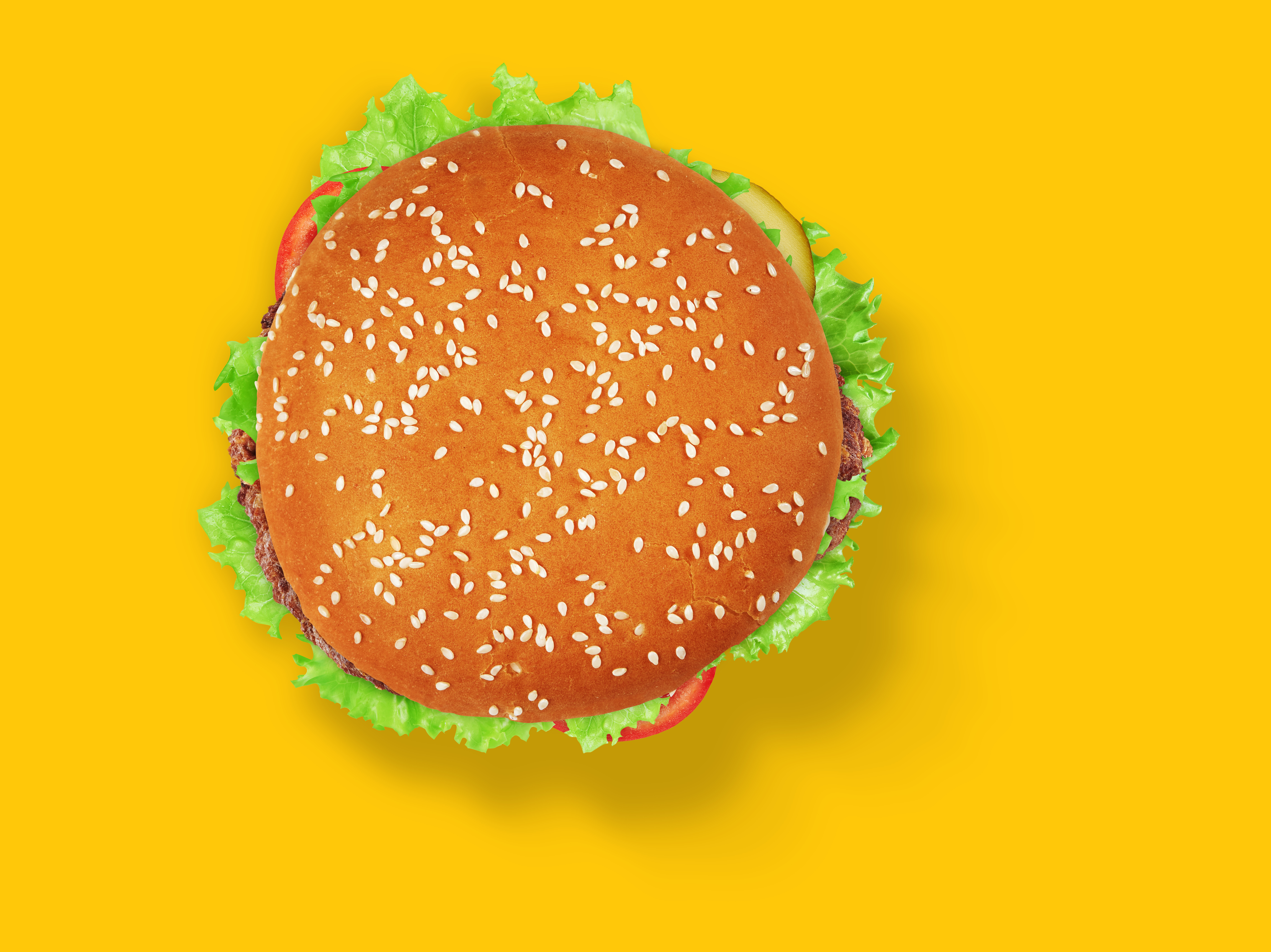 Family Nights, Done Right: Quick, Wholesome Meals at Jubilee Juice & Grill! 3 fresh tasty burger on yellow background top view 3b0a29f7e36e9a27f700