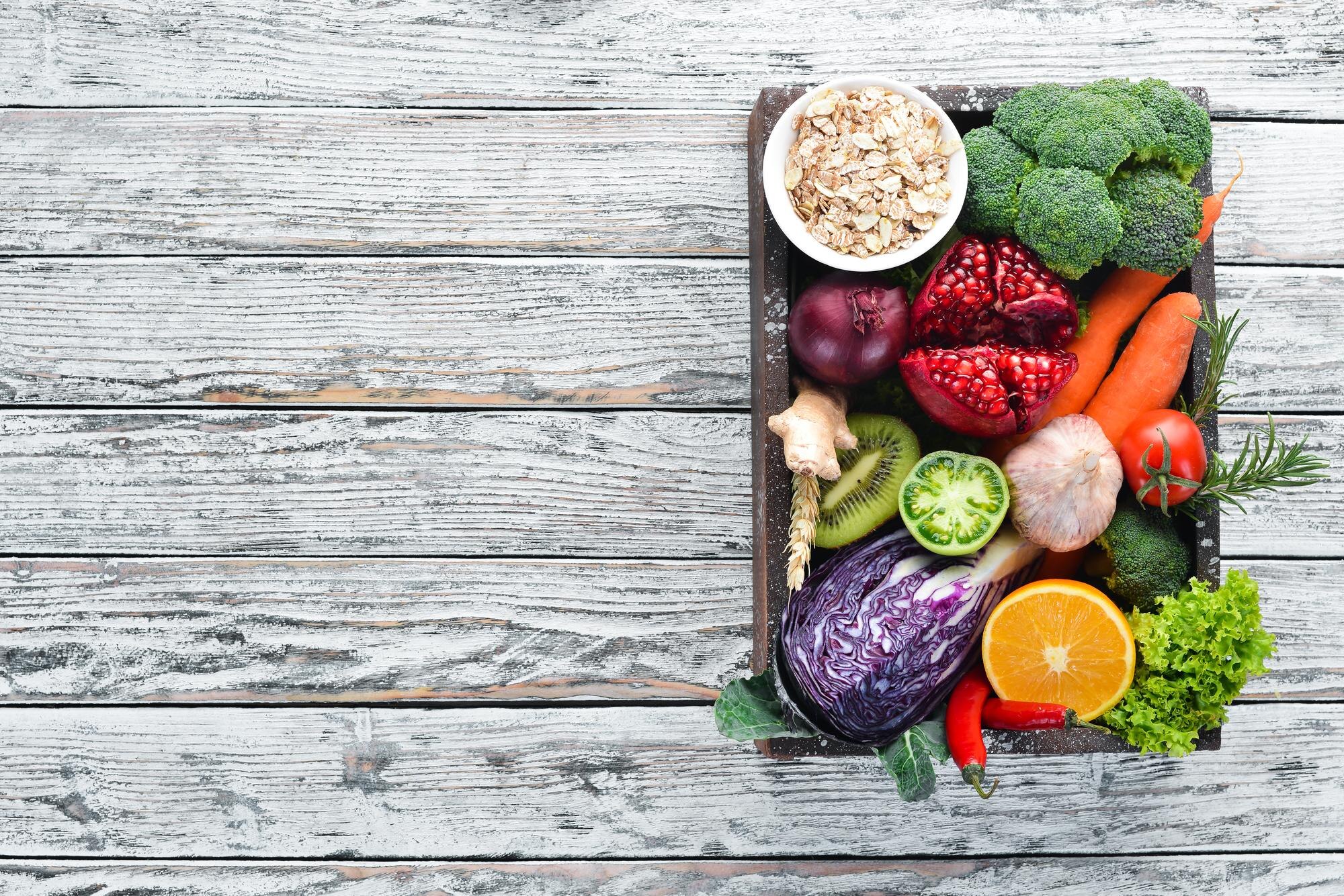 Fresh Vegetables And Fruits In A Wooden Box On A W 84647F3Accc39F27D0C6