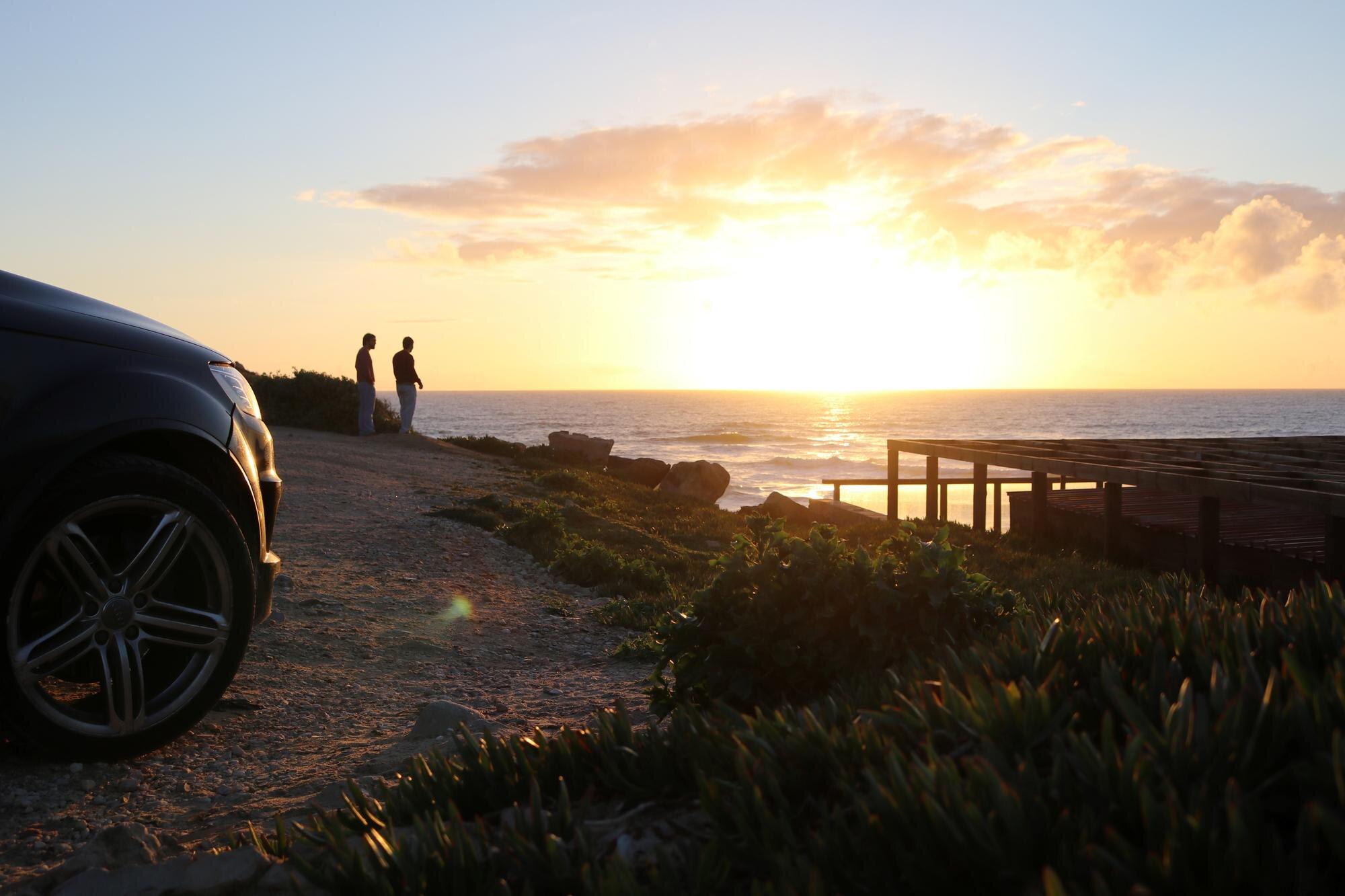 friends standing on hill against sea during sunset a1e1172dffb8db712bb1 BTOURS