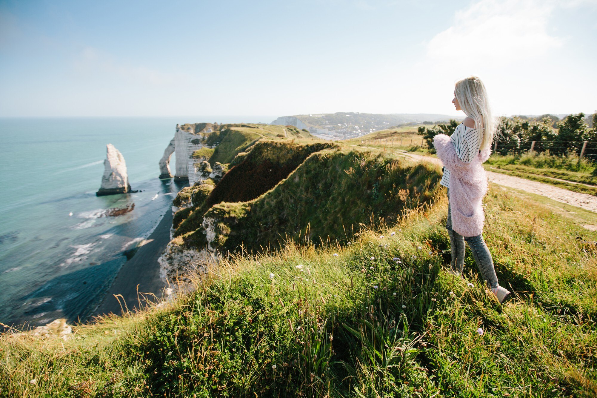 girl hiking and taking picture of etretat cliffs a b54096e8c342db1fca44 BTOURS
