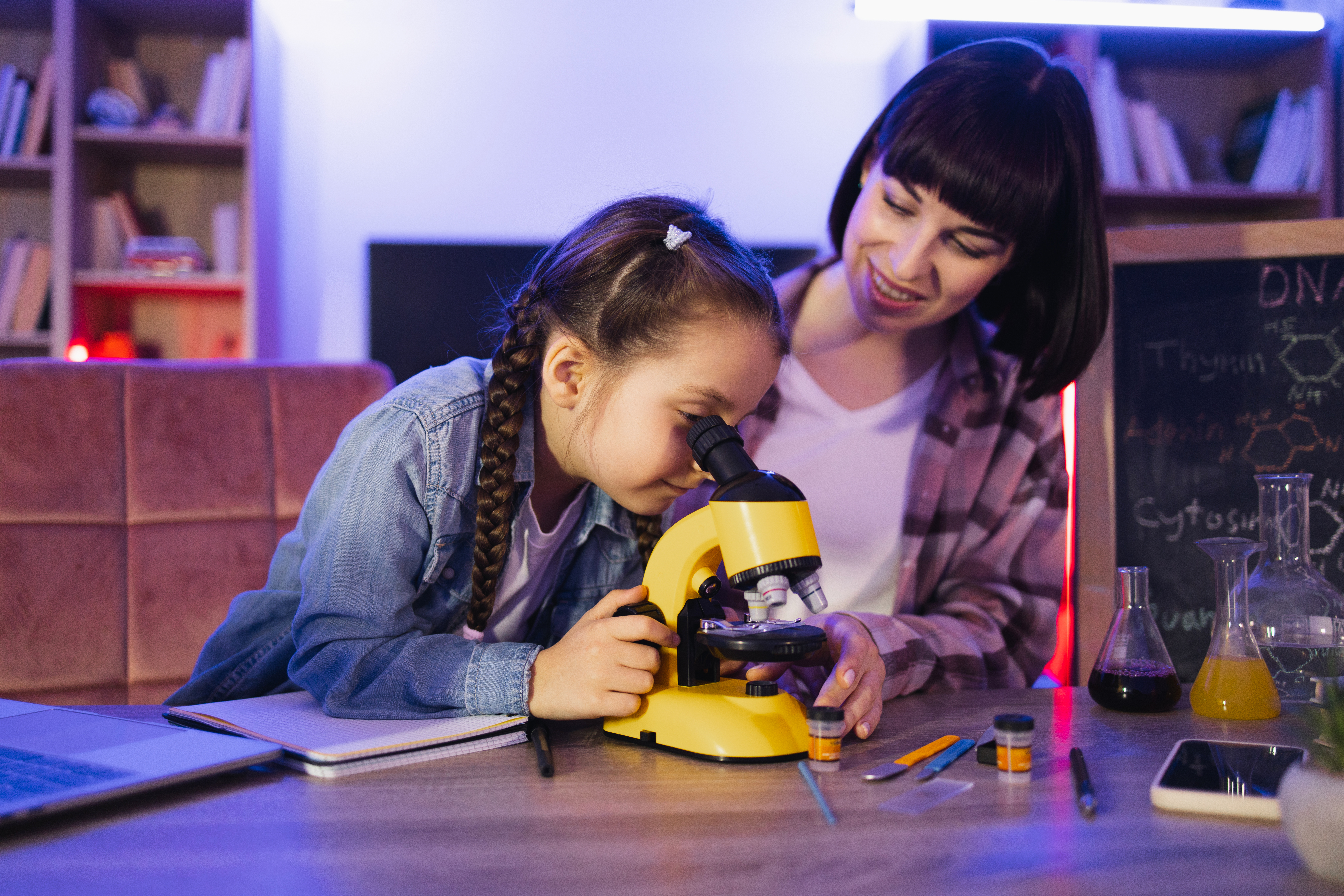 Girl Looking At Onion Cells In Microscope While He 7bcfa781d243b84ddf2f
