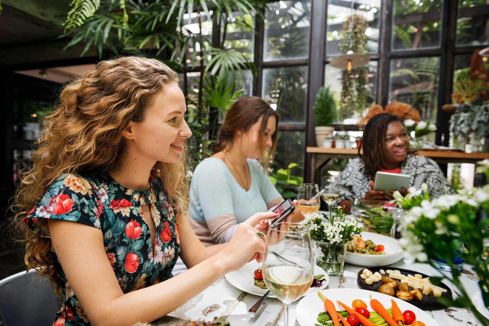 3 ladies enjoying vegetables