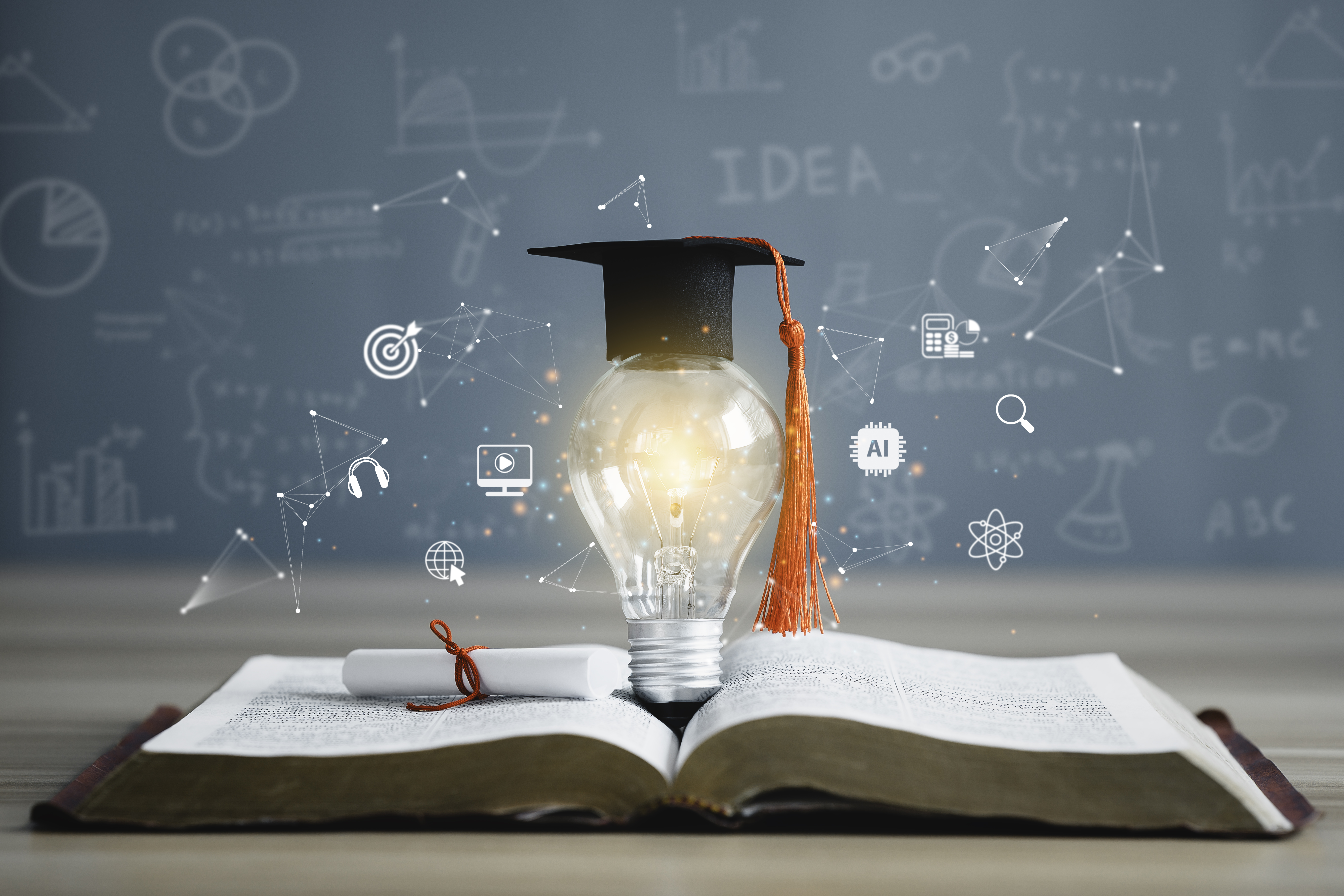 Illustrative image of a book with a lamp and graduation hut to reflect confidence in candidates OET preparation - #The best OET preparation course.