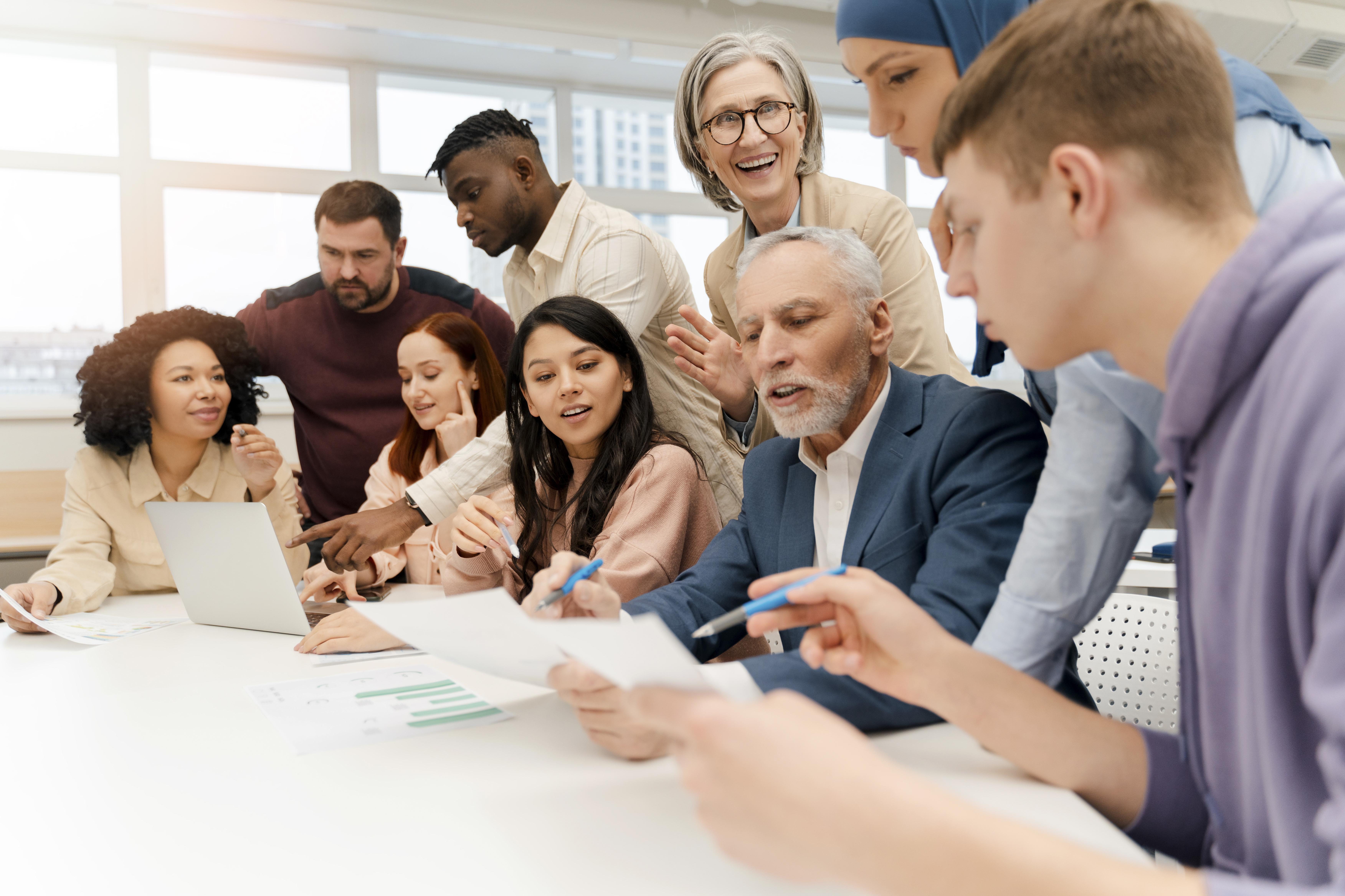 Building a Sales Coaching Culture: The Key to Sustainable Performance 1 group business people brainstorming sharing ideas f94101b66ac742579130