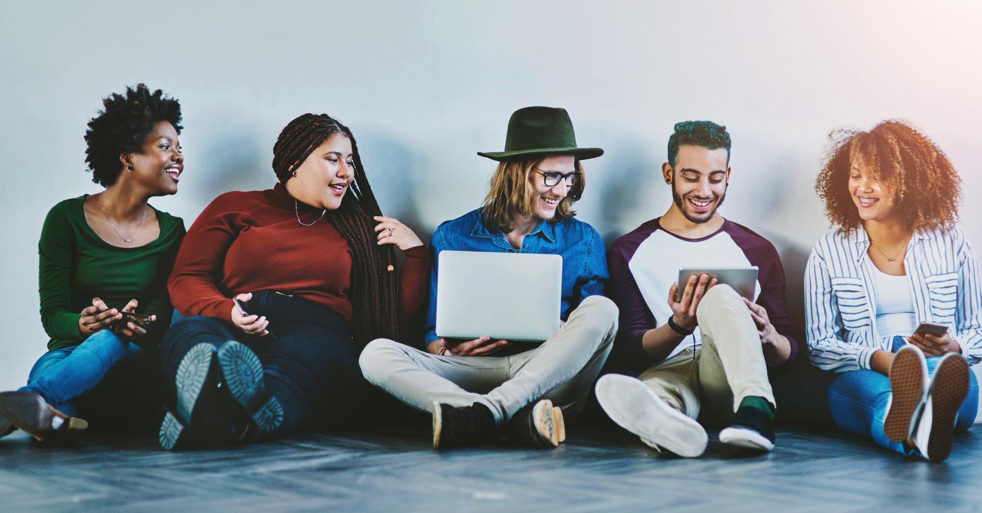 Group Friends And Students With Technology On Floo Bd73ffea0fd26d983218