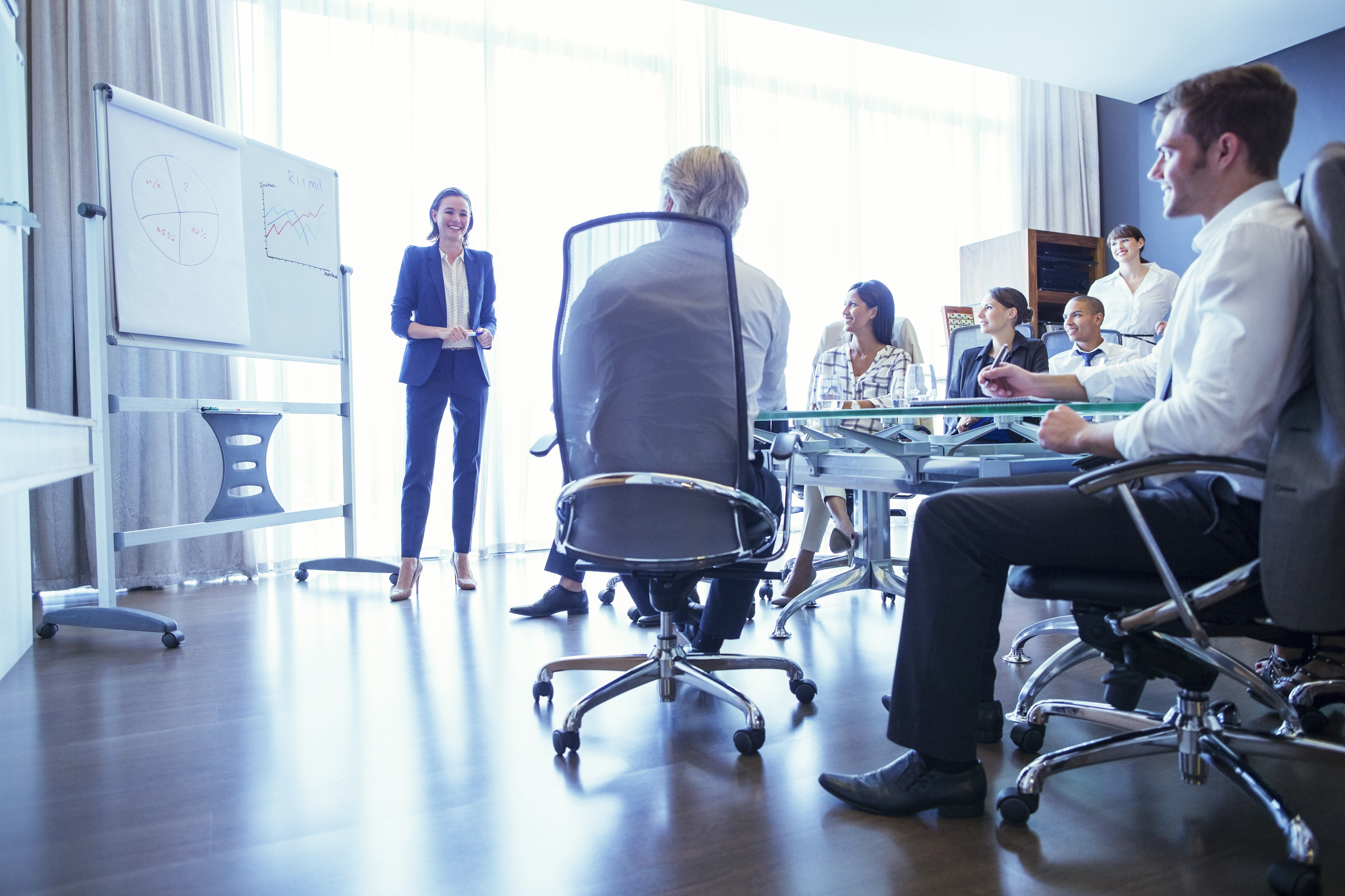 group of business people listening to presentation 58607b2534d573105c33
