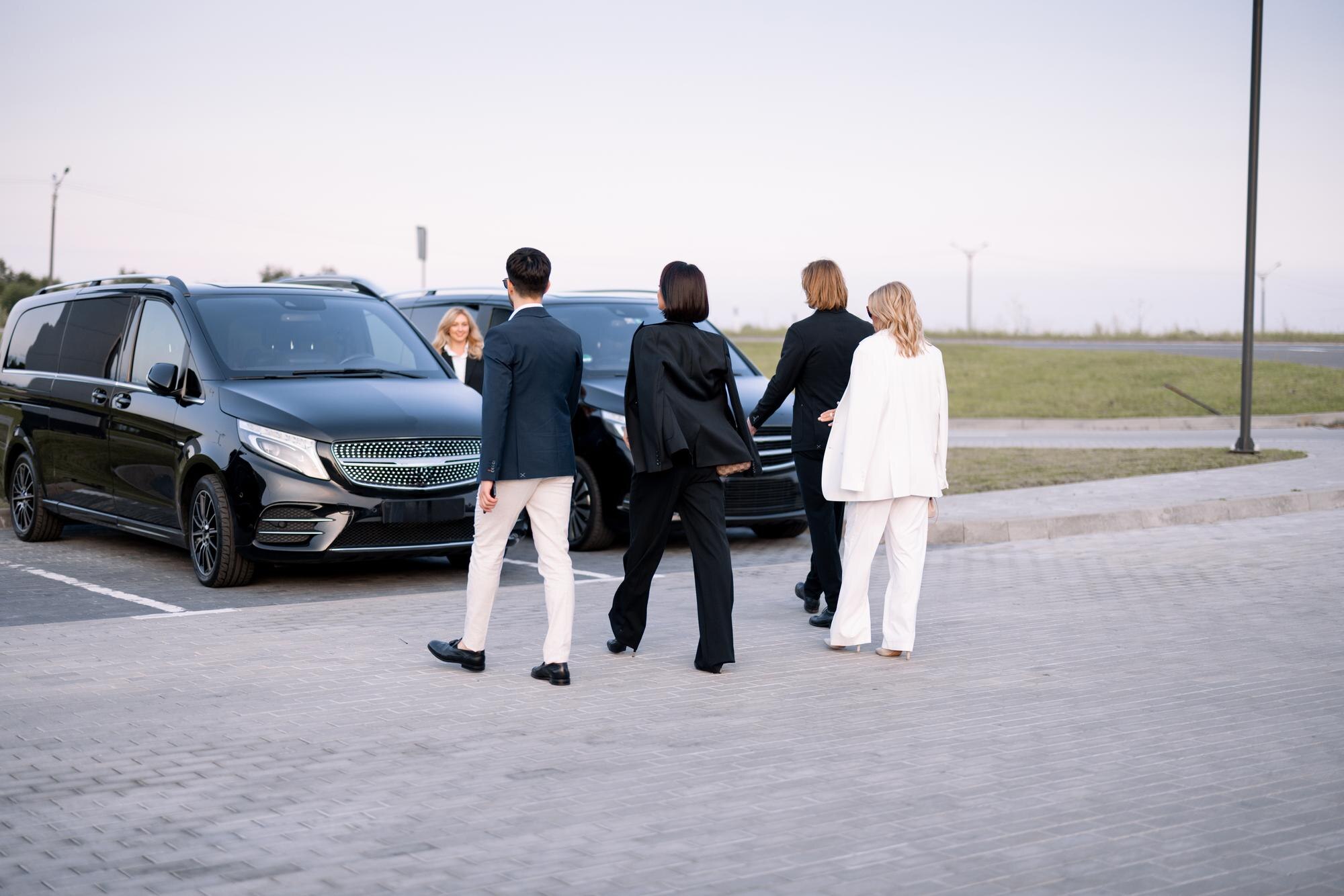 Mak Louren Chauffeur Service | Wellesley & South Shore Executive chauffeur meeting clients for Logan Airport transfer in Wellesley MA