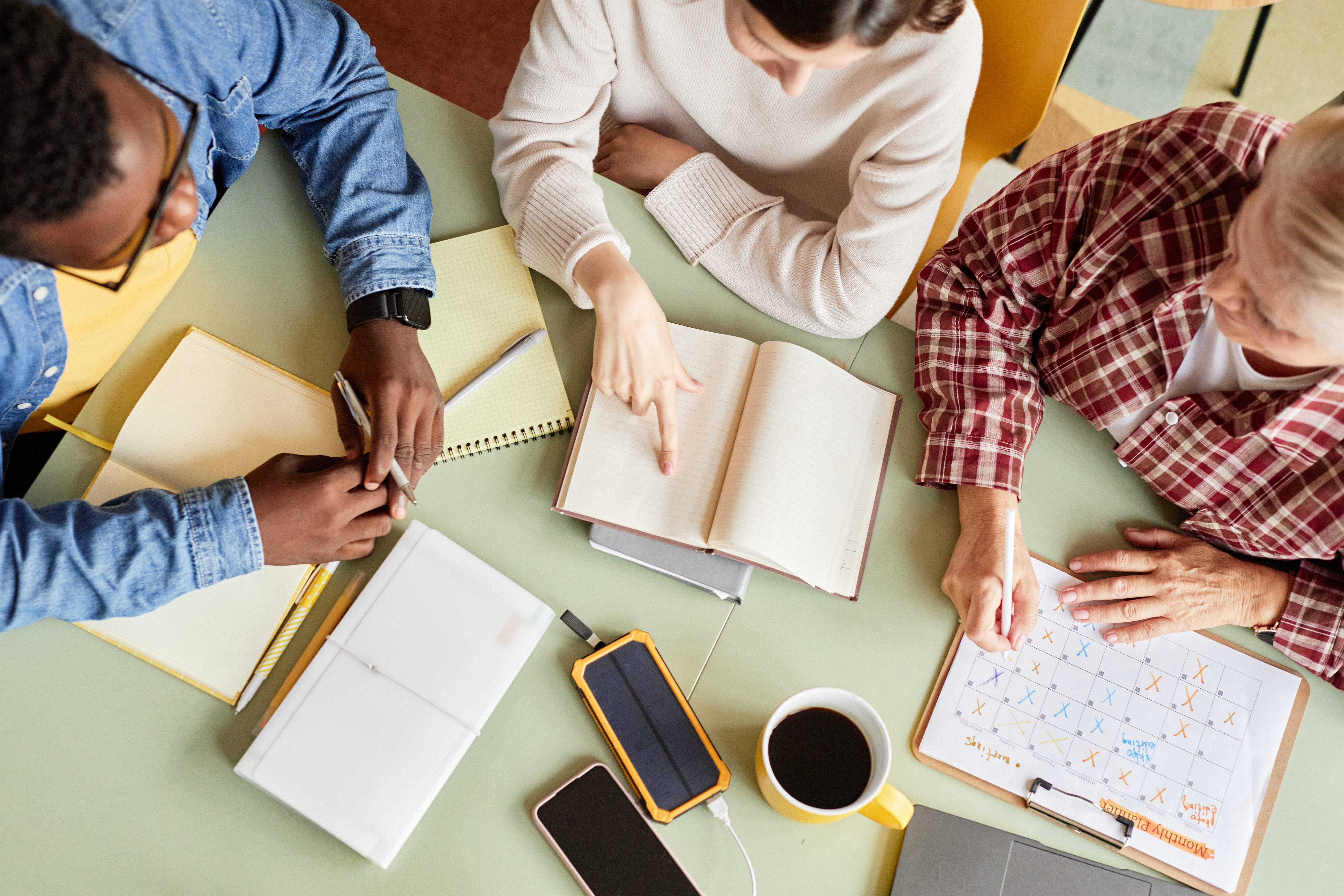 Crafting Your Personal Growth Plan: Practical Tools For Real Change 2 Group Of Coworkers Talking While Planning Schedule B5D614D5122De18E3937