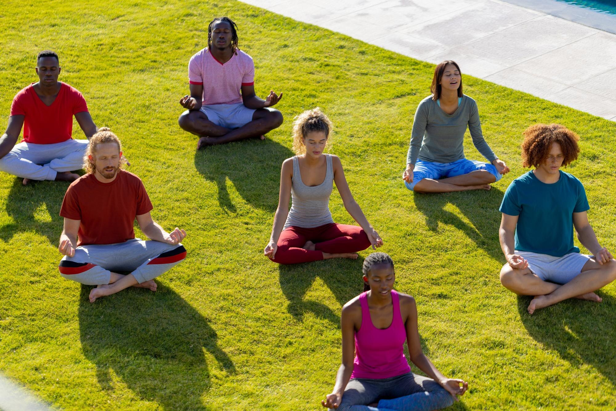 group of diverse friends doing yoga and meditating 19e332f515effdec4cf8
