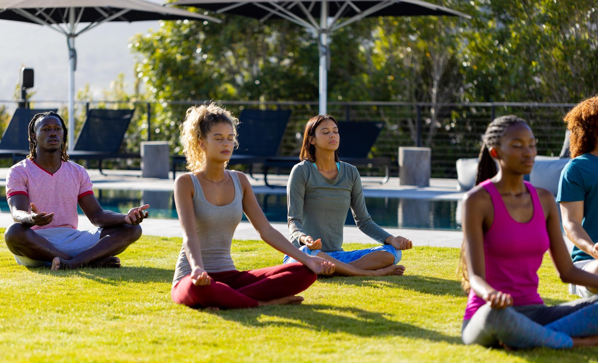 The Science Of Habit Formation: Why It Matters For Real-Life Growth 3 Group Of Diverse Friends Doing Yoga And Meditating 59Ce369B6C0A7D201Cc8