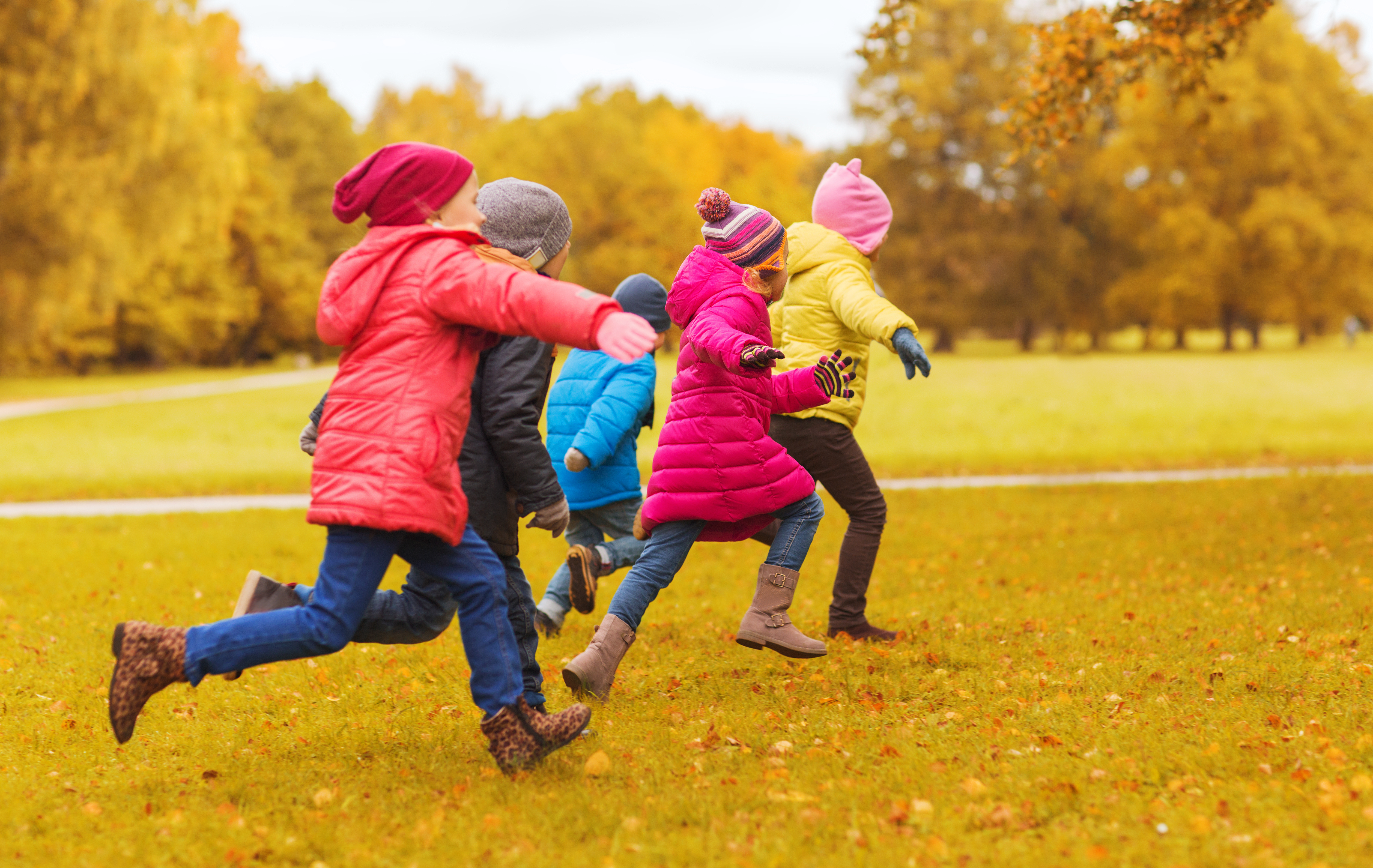 group of happy little kids running outdoors 0ab6ad7a3a9a7d073889