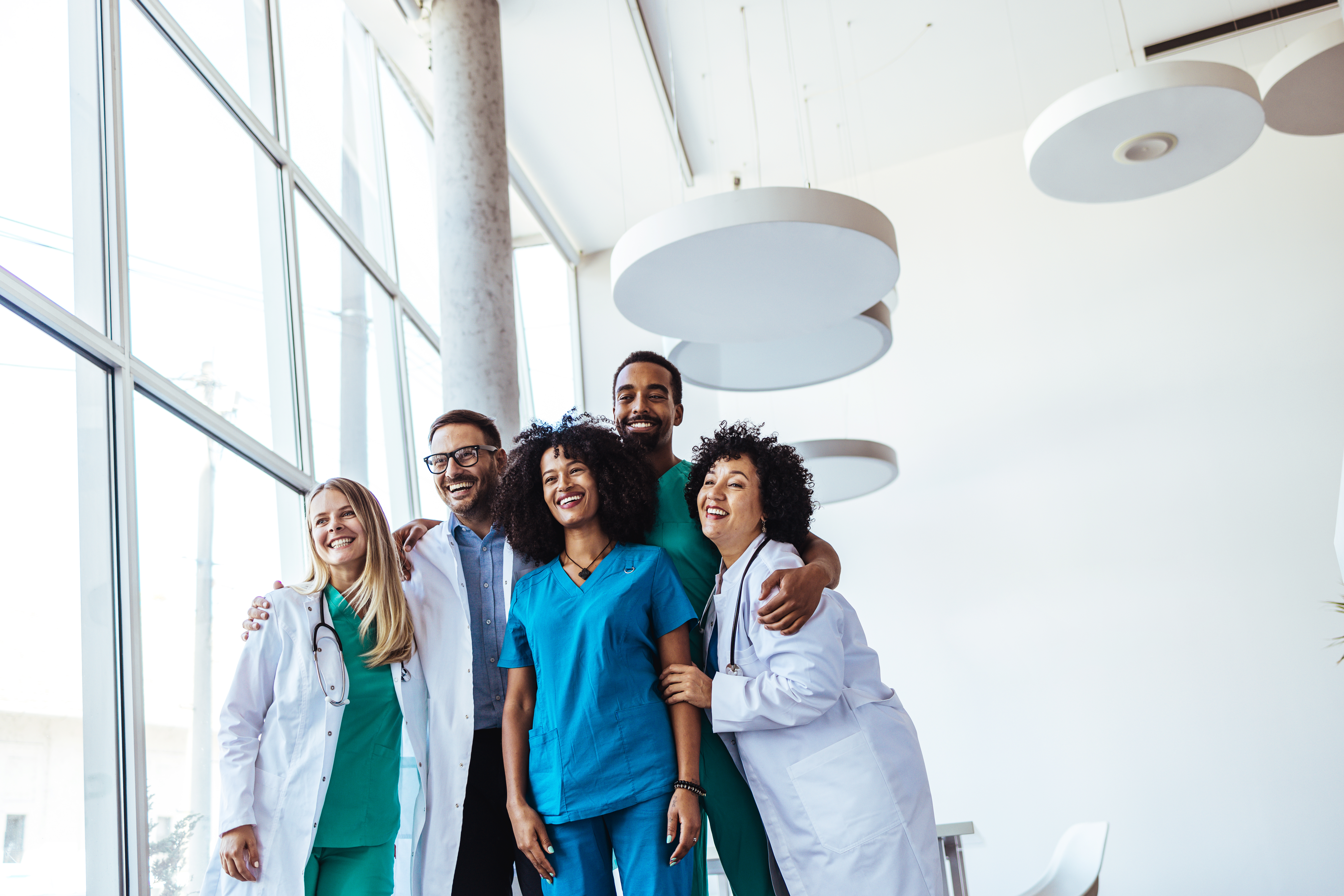 Accelerate Your Medical Career with MedSolutions: Leveraging Comprehensive Support Group Of Happy Medical Professionals Standing Toge A8988f96671f69af4cf4