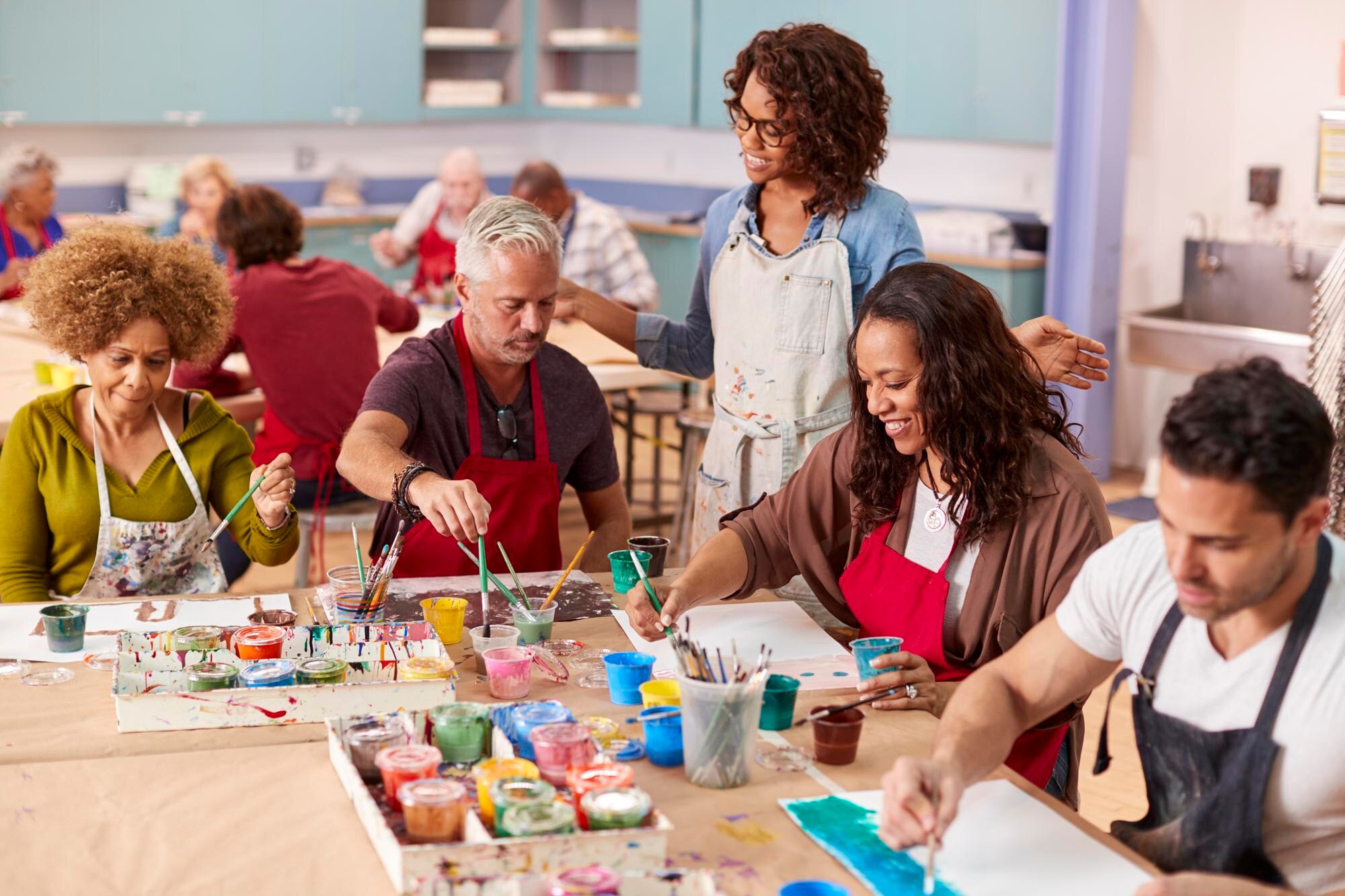 group of mature adults attending art class in comm 004ca4bc96f5d35c3507