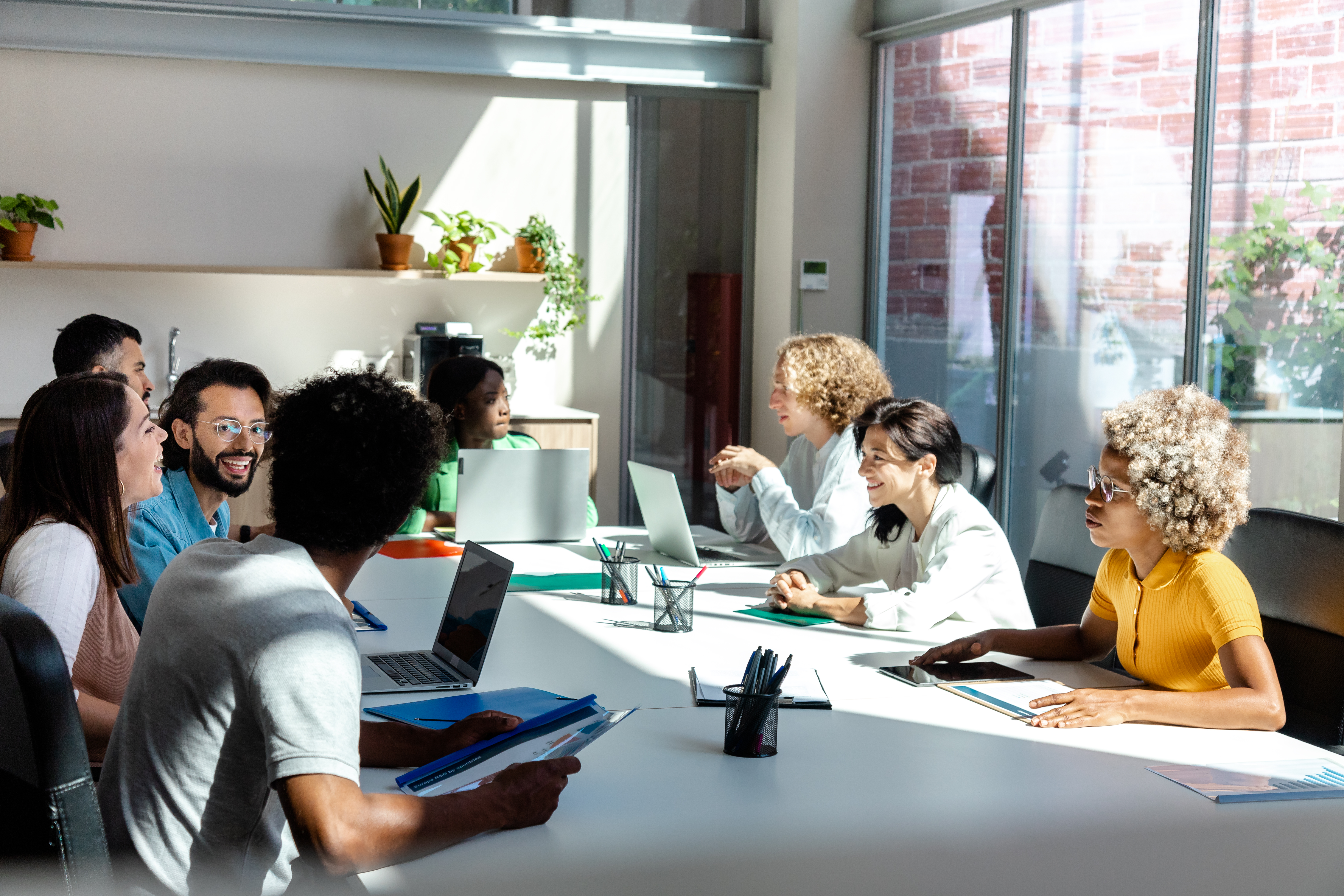 group of multiracial young colleagues talking in b a82f09349de5be1baadf