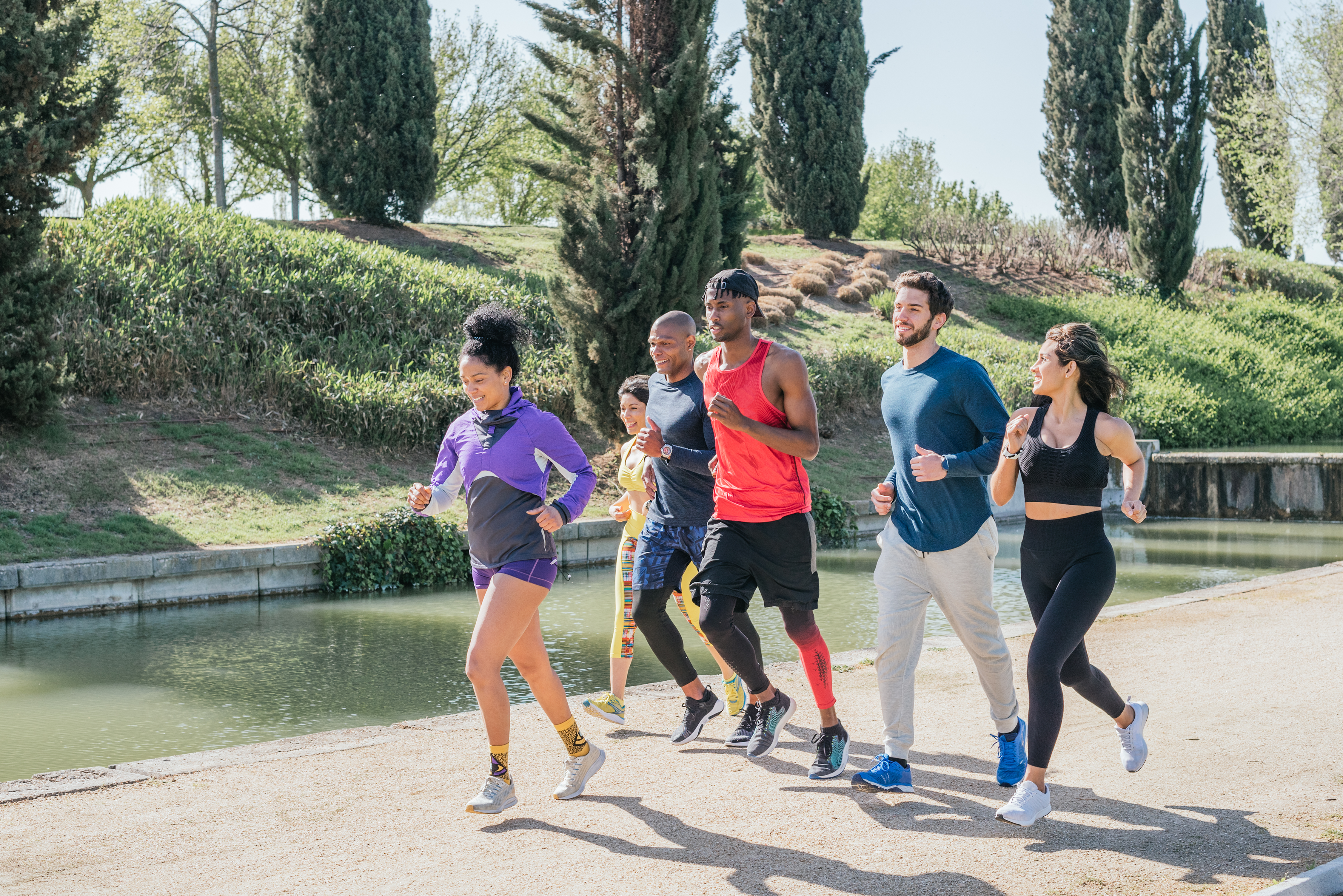 Group of runners training in a park