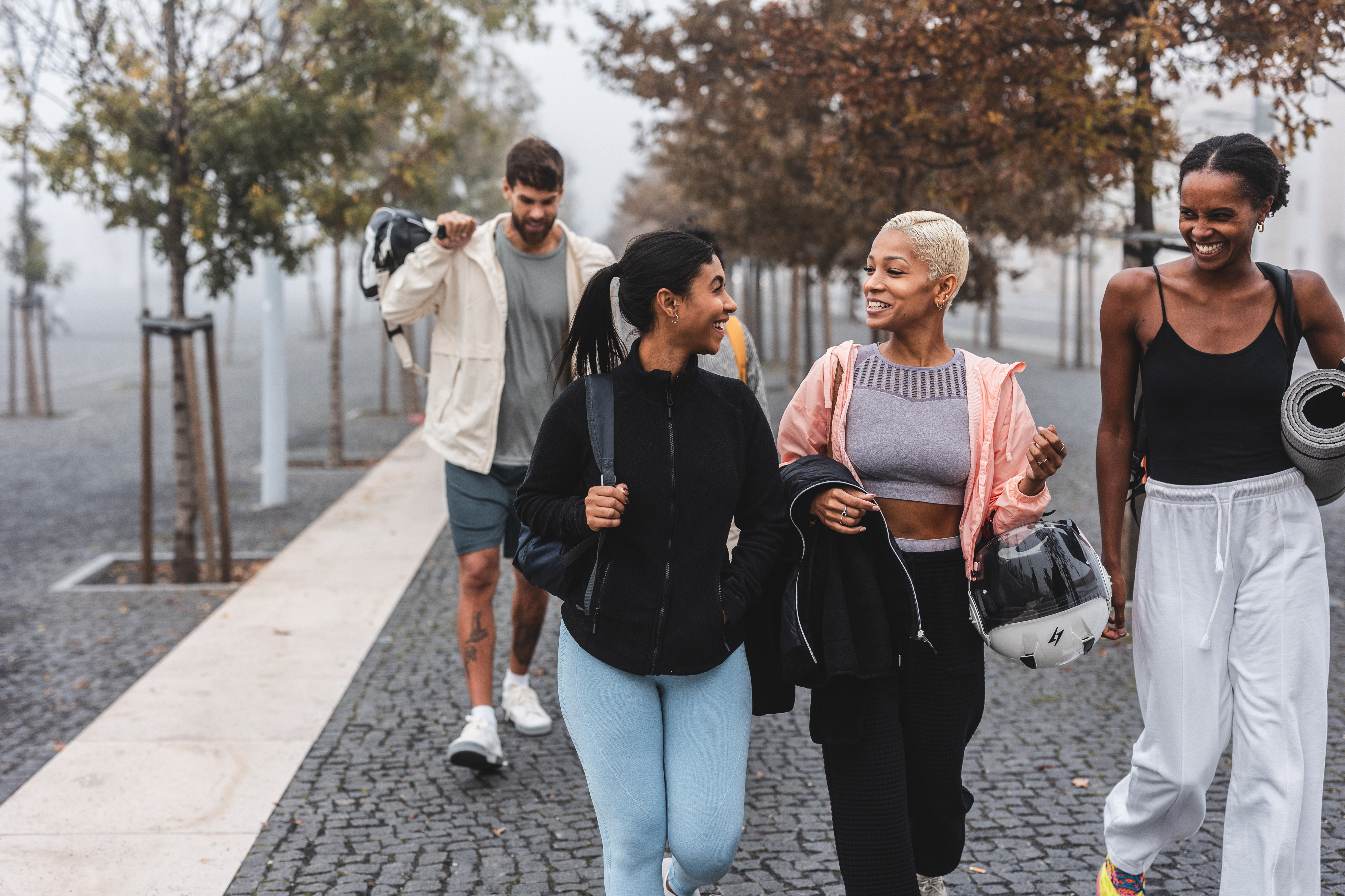 Practical Paths To Sustainable Wellness: Turning Sour Moments Into Sweet Victories 2 Group Of Sporty Friends Walking Together In The Ci 295Fac9D60Dd74513255