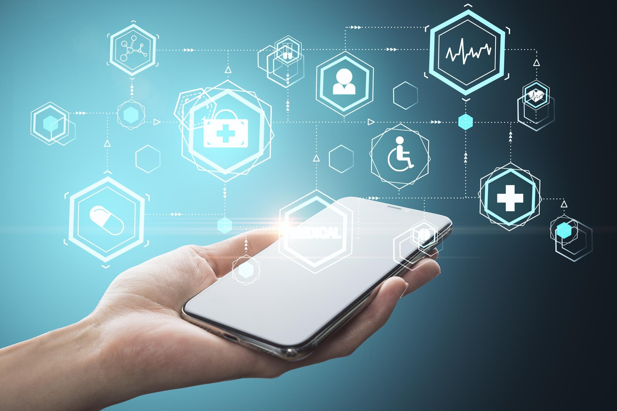 Unlocking the Power of Mobile Optimization for Healthcare Websites 2 - MedWell Digital Marketing Agency hand holding smartphone with glowing medical inter 764aa1b8b6c8f853bcc1 - MedWell Digital Marketing Agency