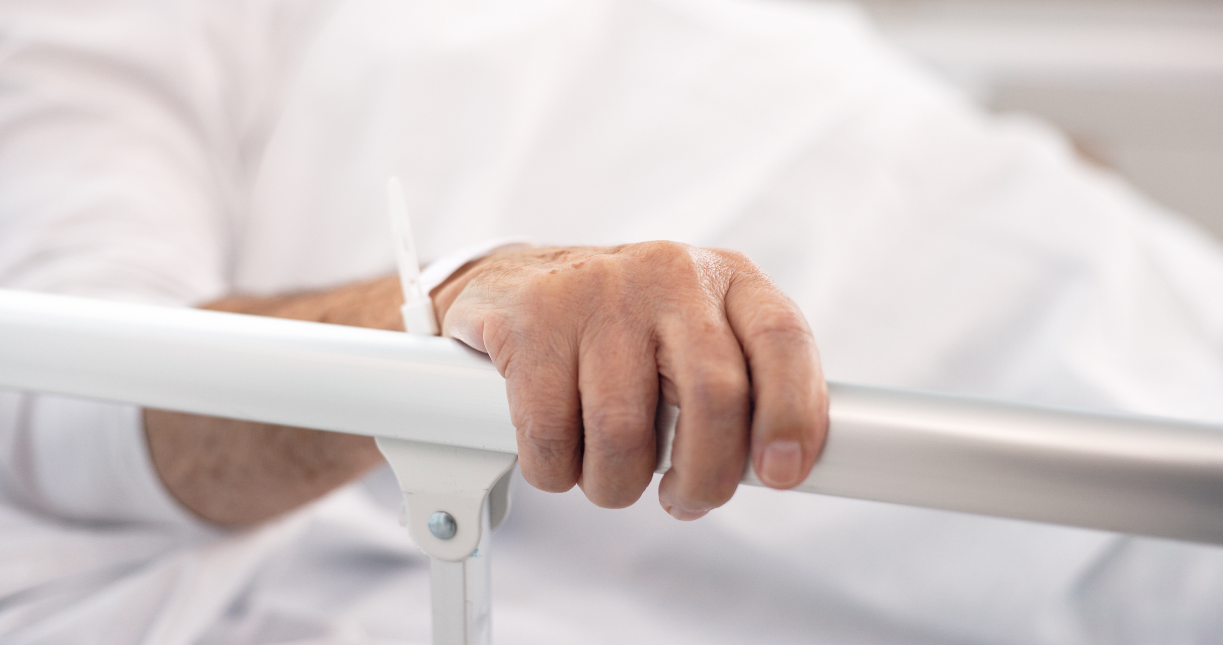 hand on rail patient and hospital bed for healthc 6f965047297d35e3518b