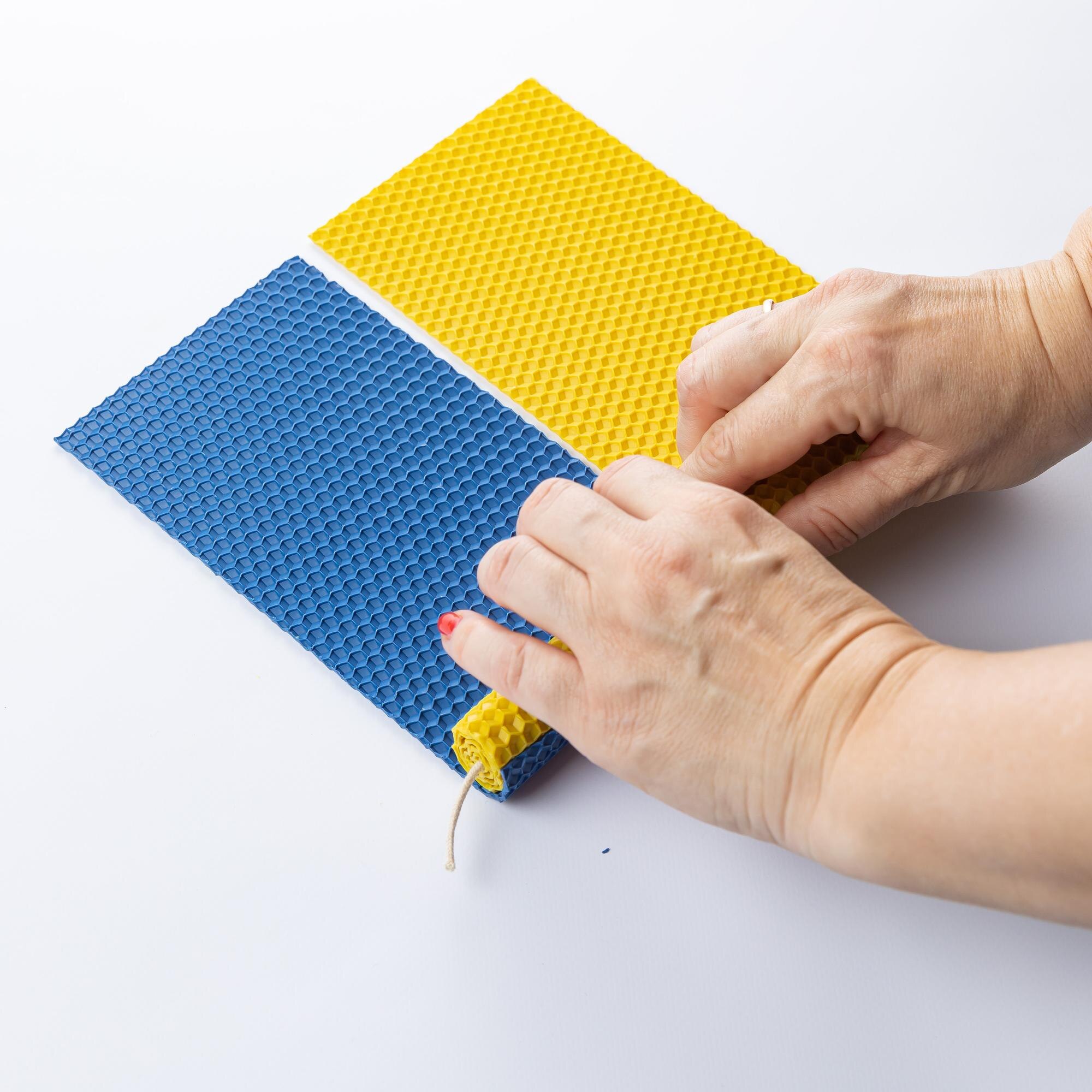 Expert tips for choosing Aussie-made custom plastic sheets and components 2 handmade candles on the background close up 55ff7a13d12d24fa8692