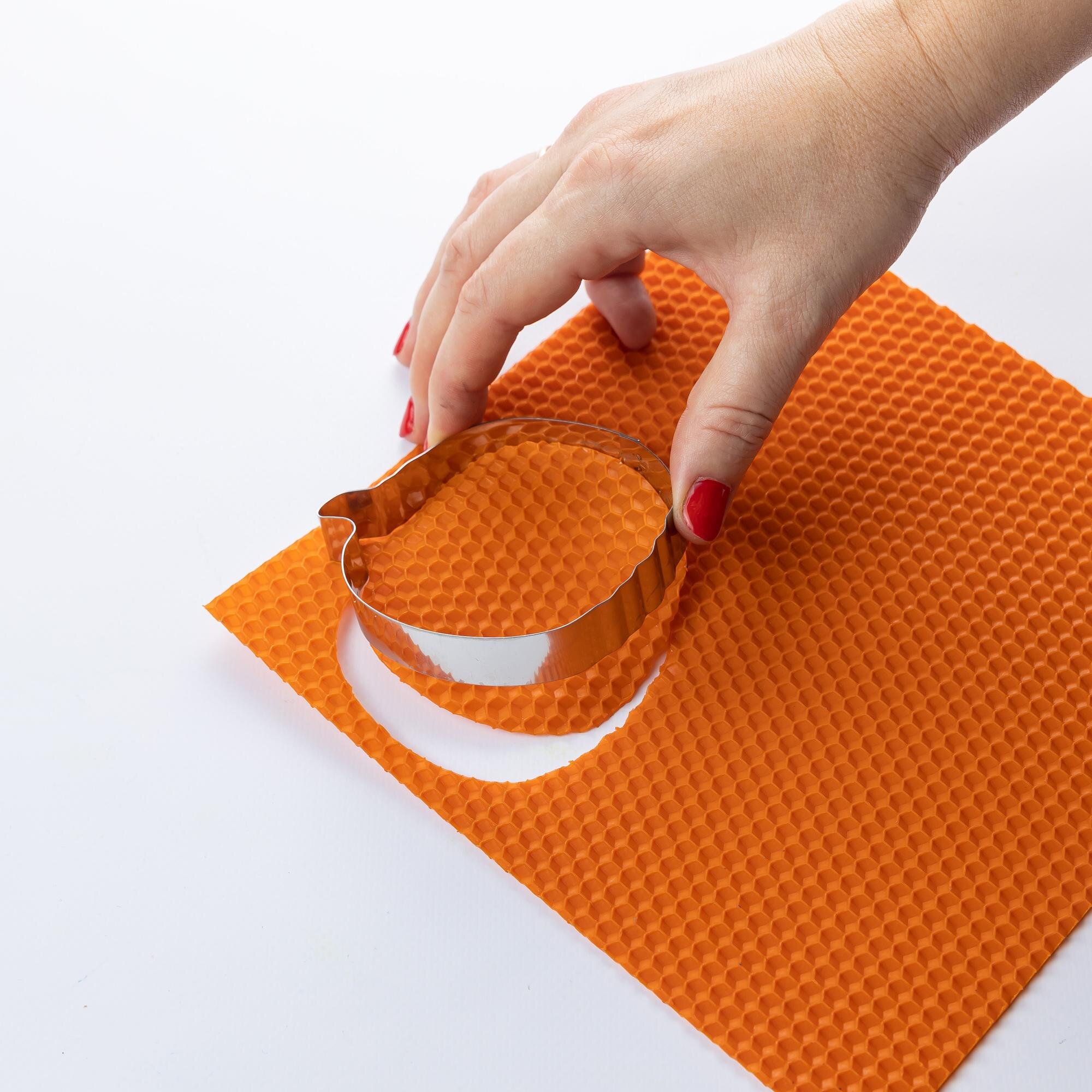 Cut-to-Size Plastic Sheets: Reduce Waste, Save Costs, Build Smarter 3 handmade candles on the background close up dc2b6a8e97179e862851