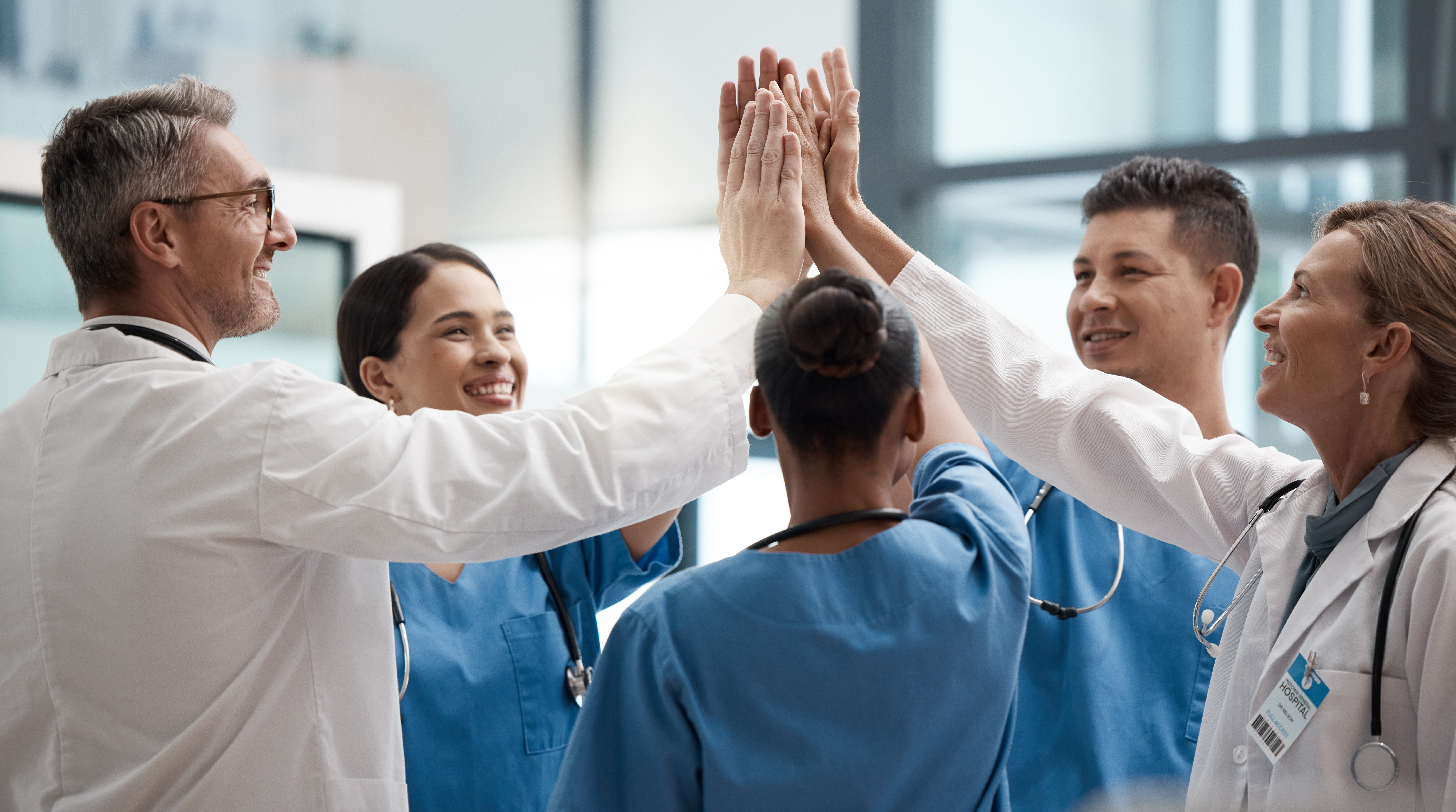 medical personnel cheering - illustrative image to describe Accordemy® refund guarantee