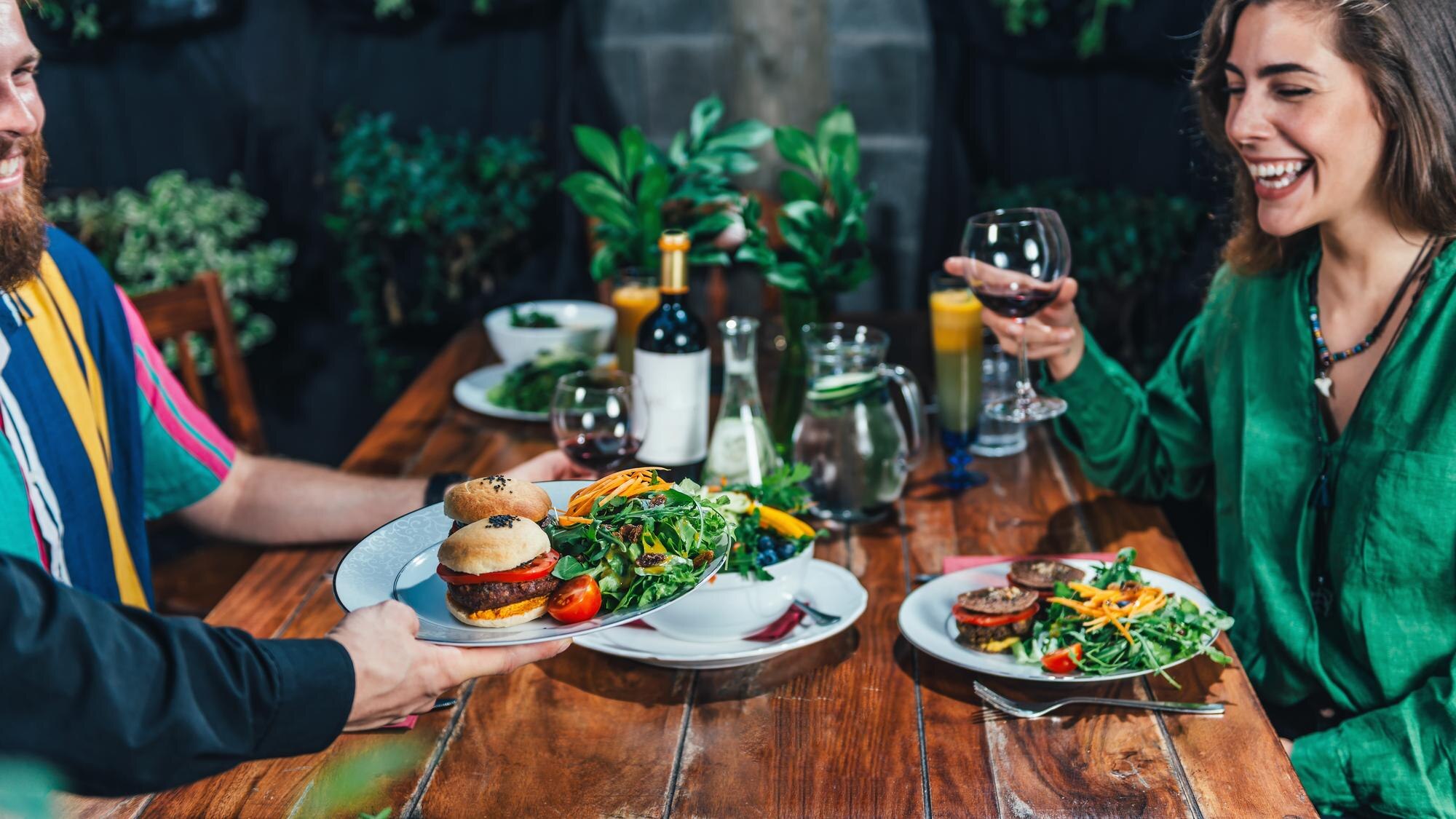 The Personal Touch: How Family-Owned Restaurants Elevate Quality 3 happy couple enjoying romantic vegetarian dinner o 58f67eb92ae4c252a877