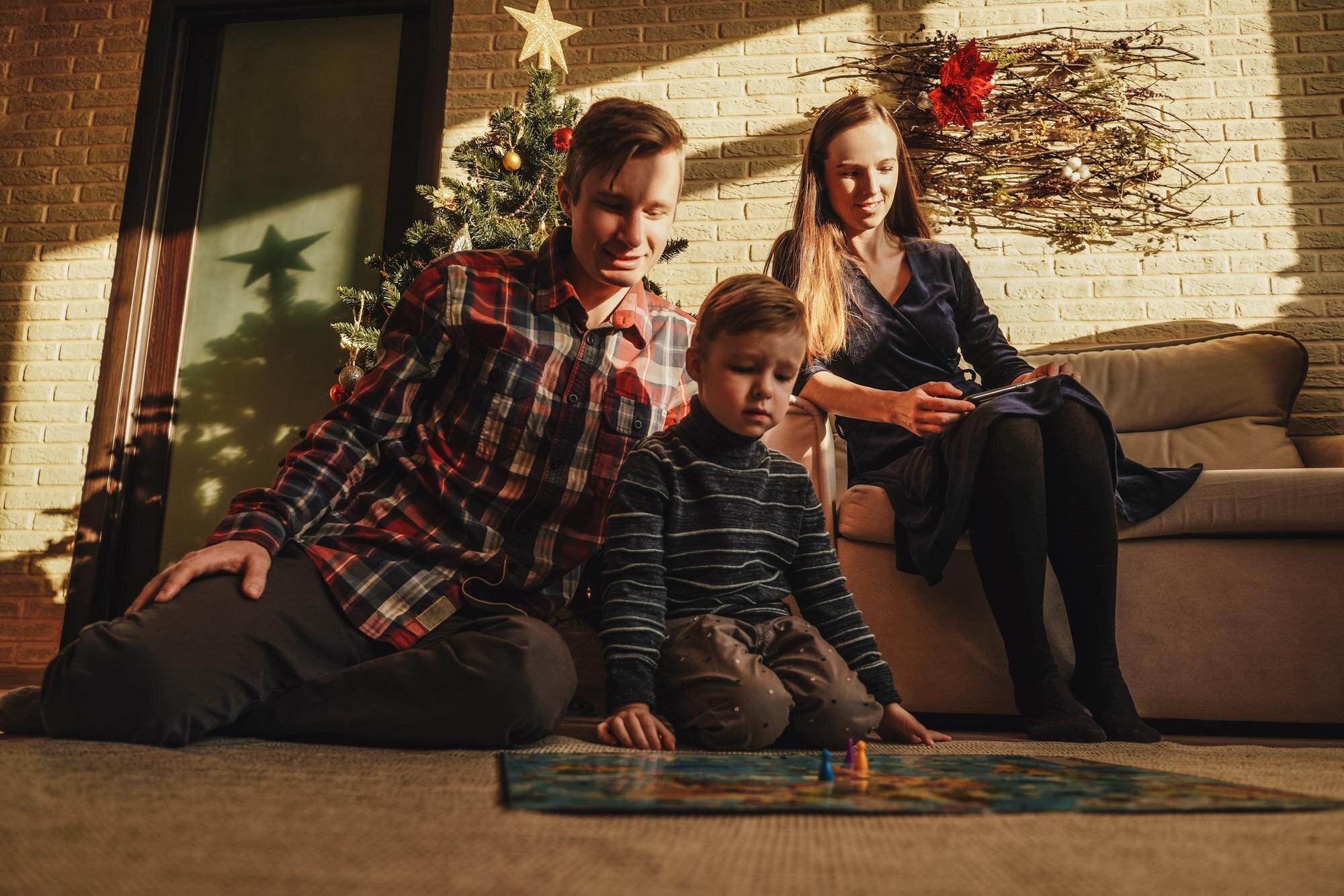 happy family playing board game walker d540d9755e358bfbc5d6
