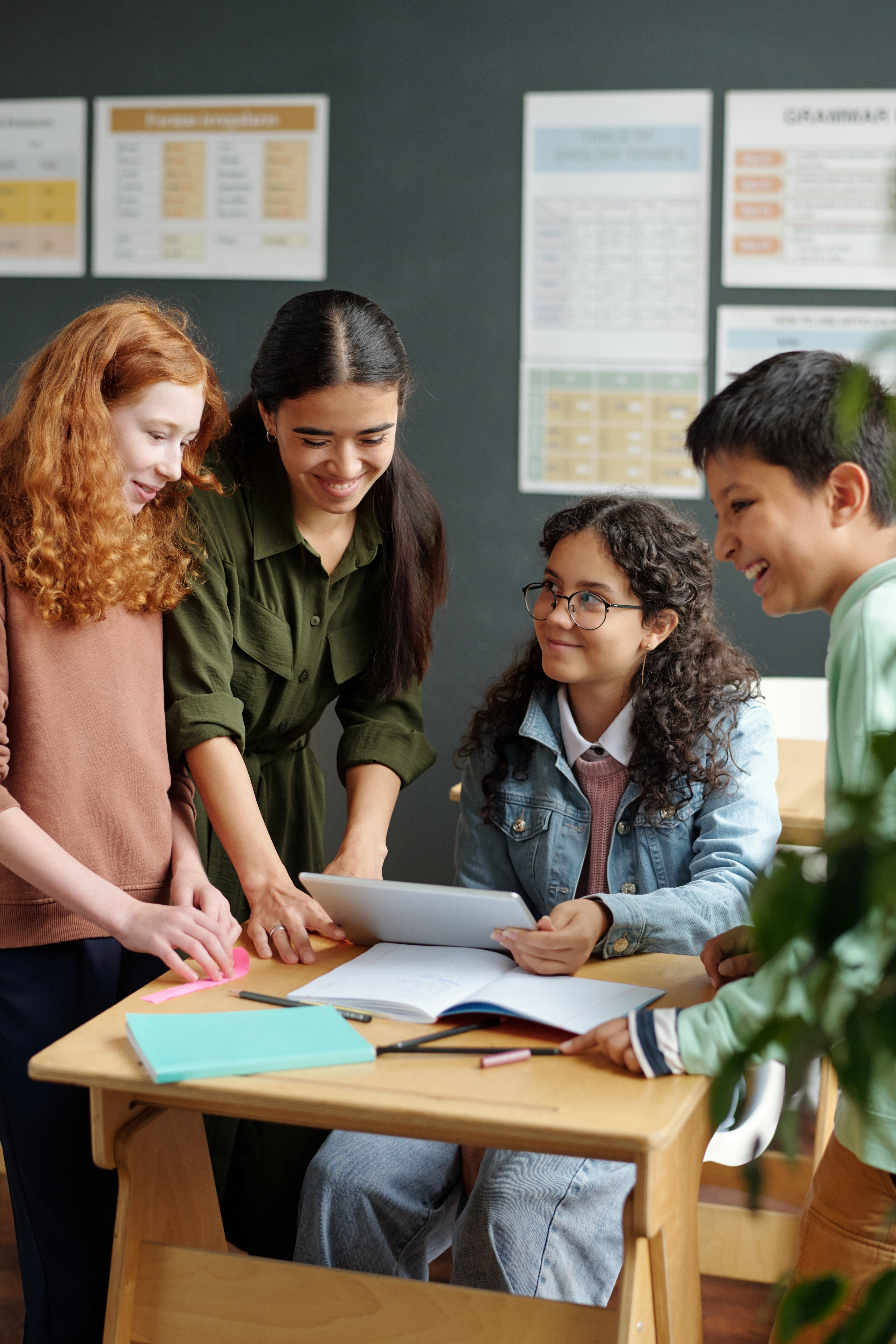 Happy Intercultural Pupils And Teacher Discussing F922db7d25e05da33c66