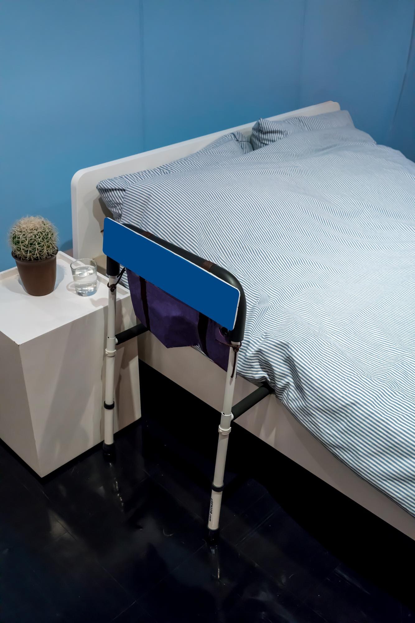 high angle view of mobility walker by bed at home 8d3a71589a7fd7715e46
