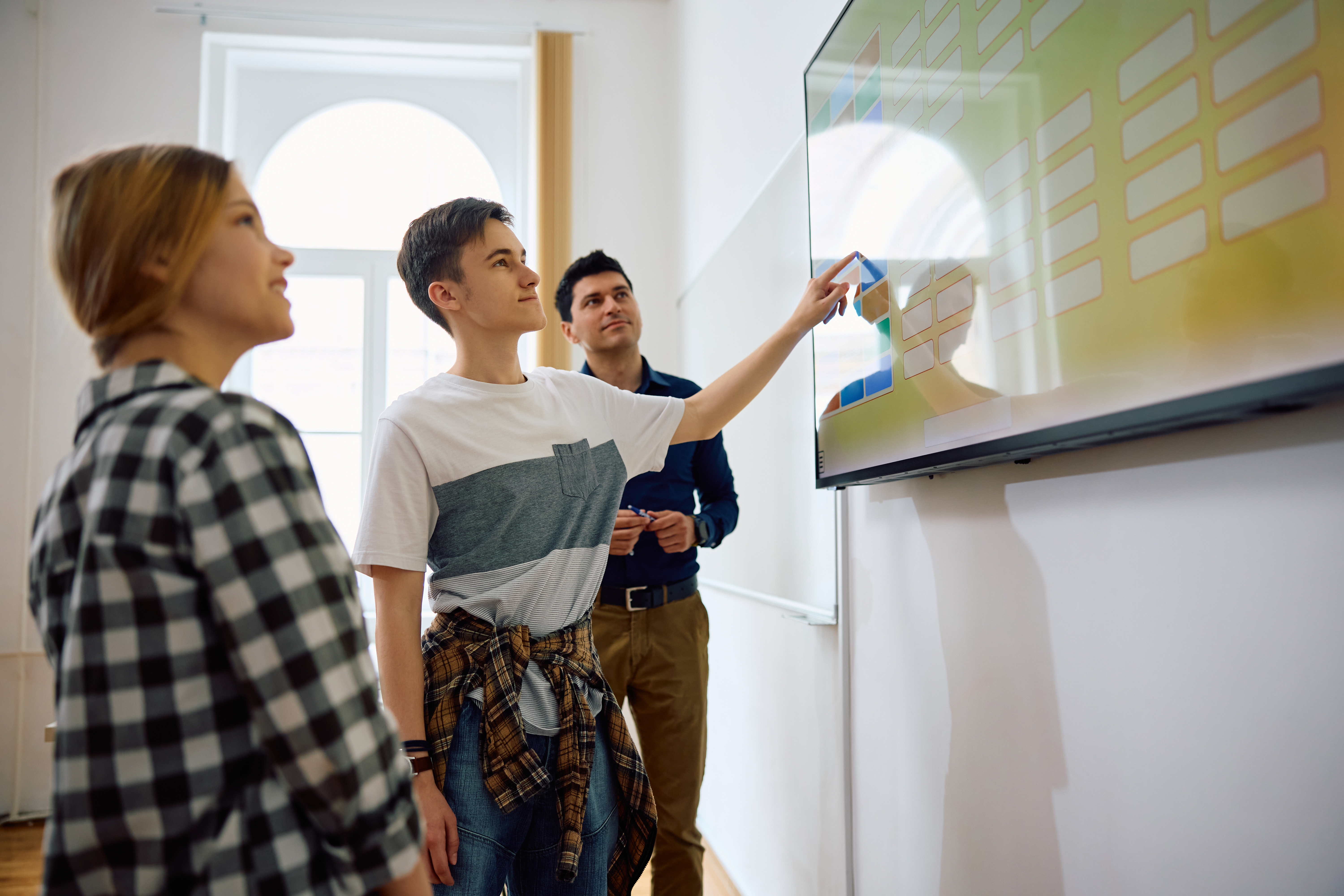 High School Student Using Smartboard During A Lect 7494ceaeceb92da20399