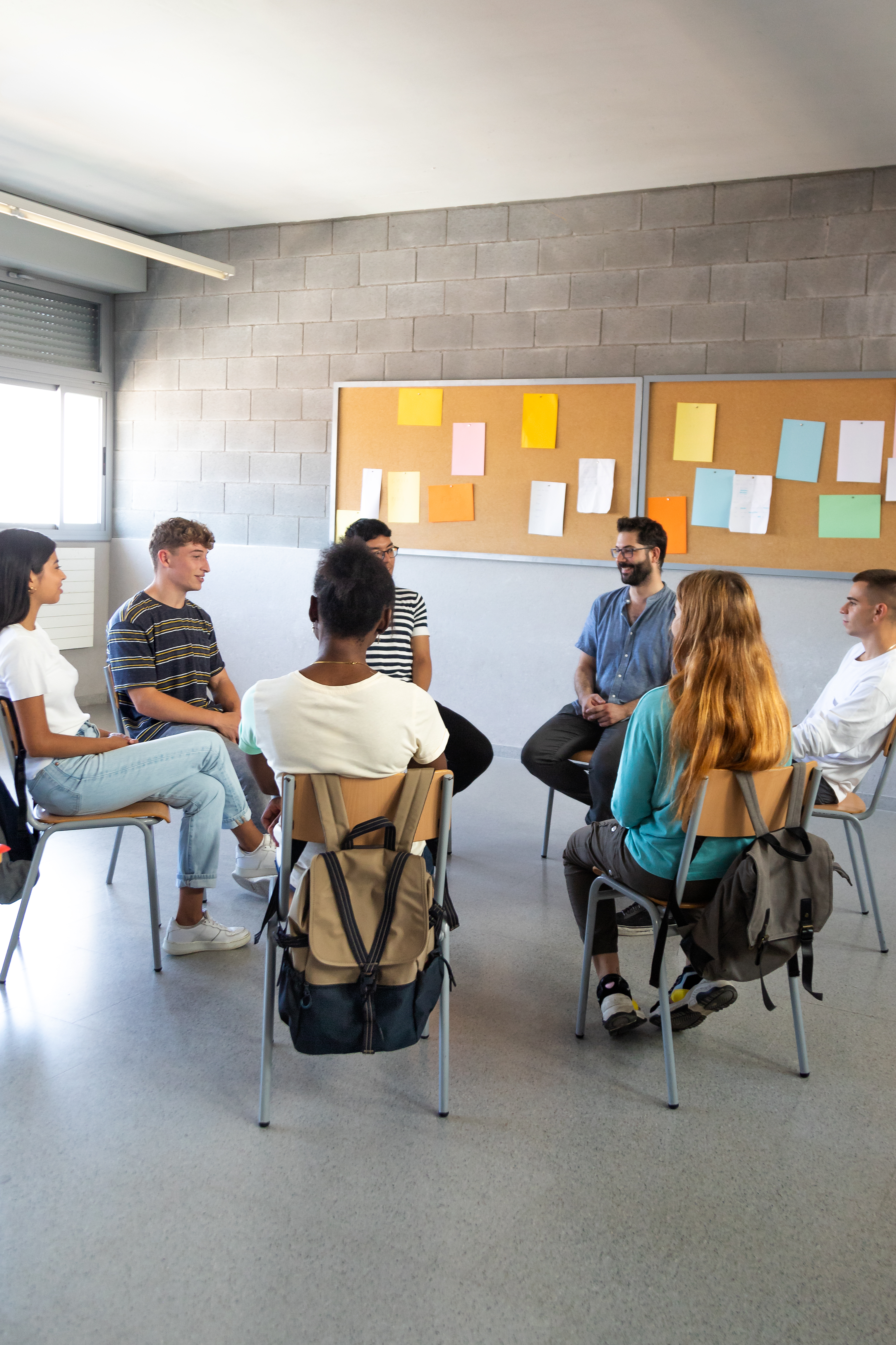 Unmasking Imposter Syndrome: Personal Stories and the Science Behind the Struggles High School Students Sitting In A Circle Sharing P Af5213fbe8634eb7a54d
