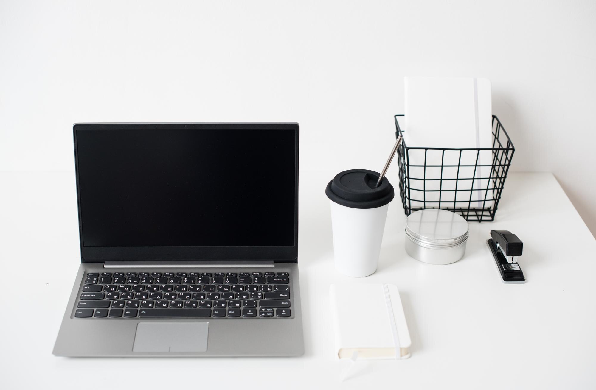 hipster bloggers work place laptop and flowers on cca29e294382b25a4eac