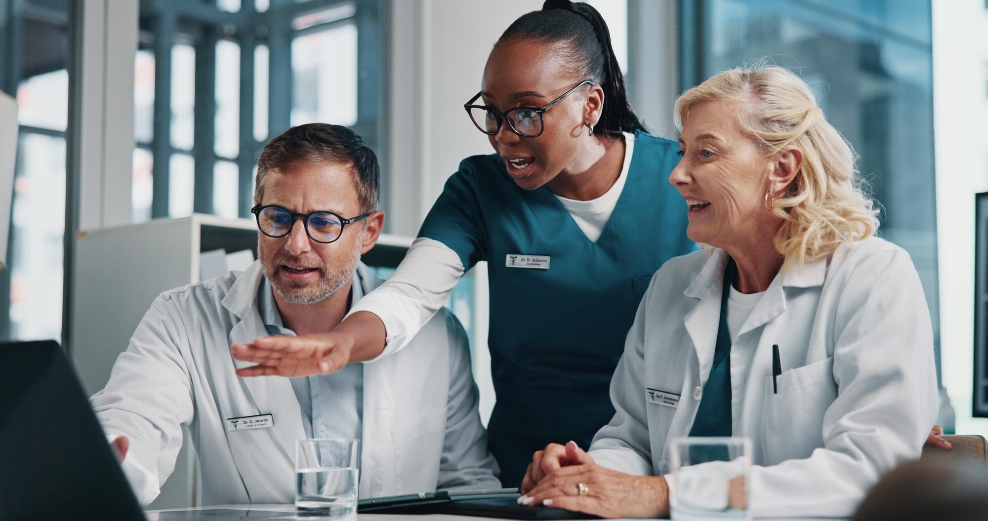 Hospital Pointing And Doctors On Laptop In Meeting 25e8726f2d511c6ead78