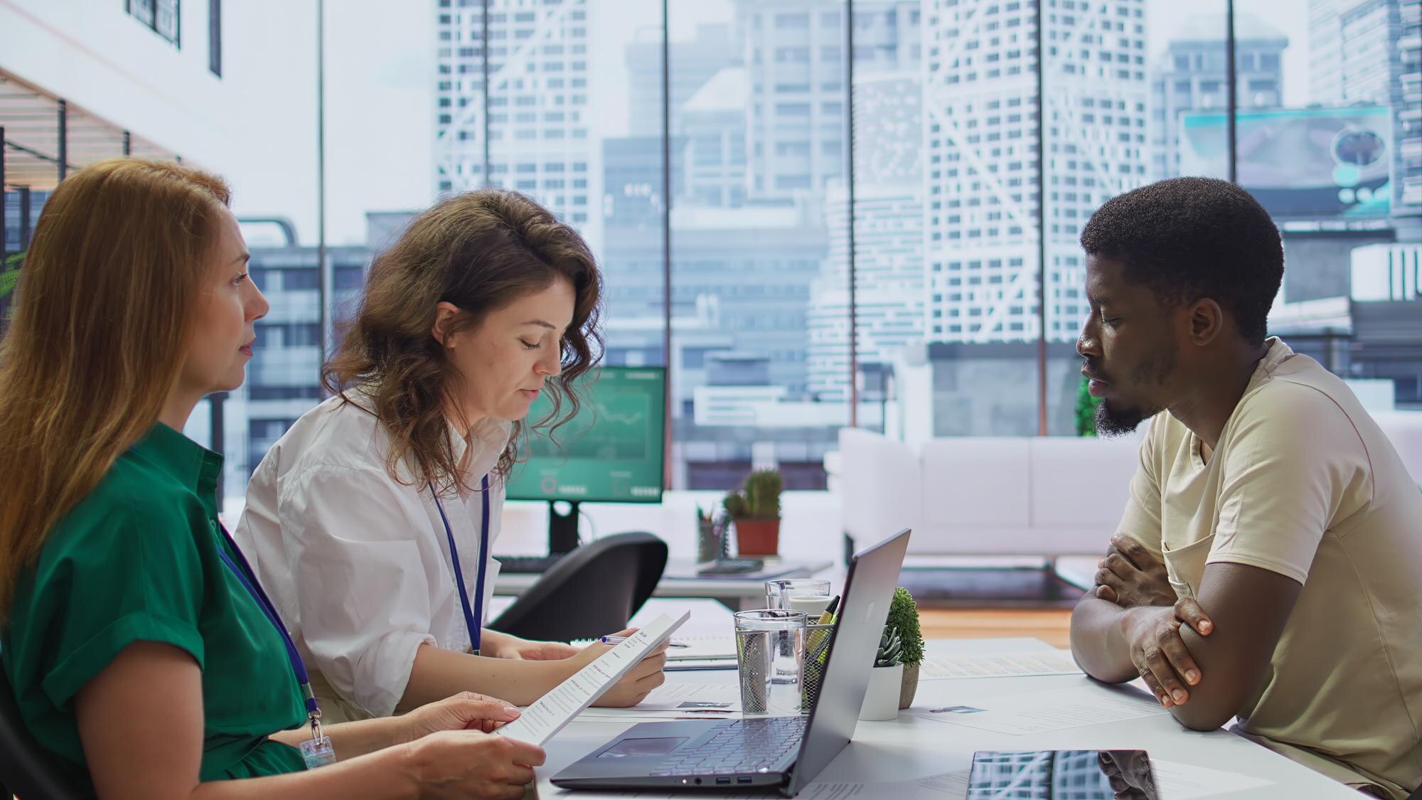 Hr Manager Conducting A Detailed Interview With A 9A4B573Bfd6B9D5B5508