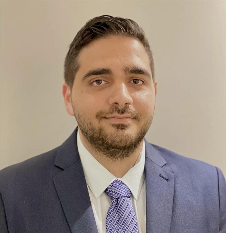 Professional man in a suit, representing business continuity and IT solutions for stable growth in NSW and Queensland.