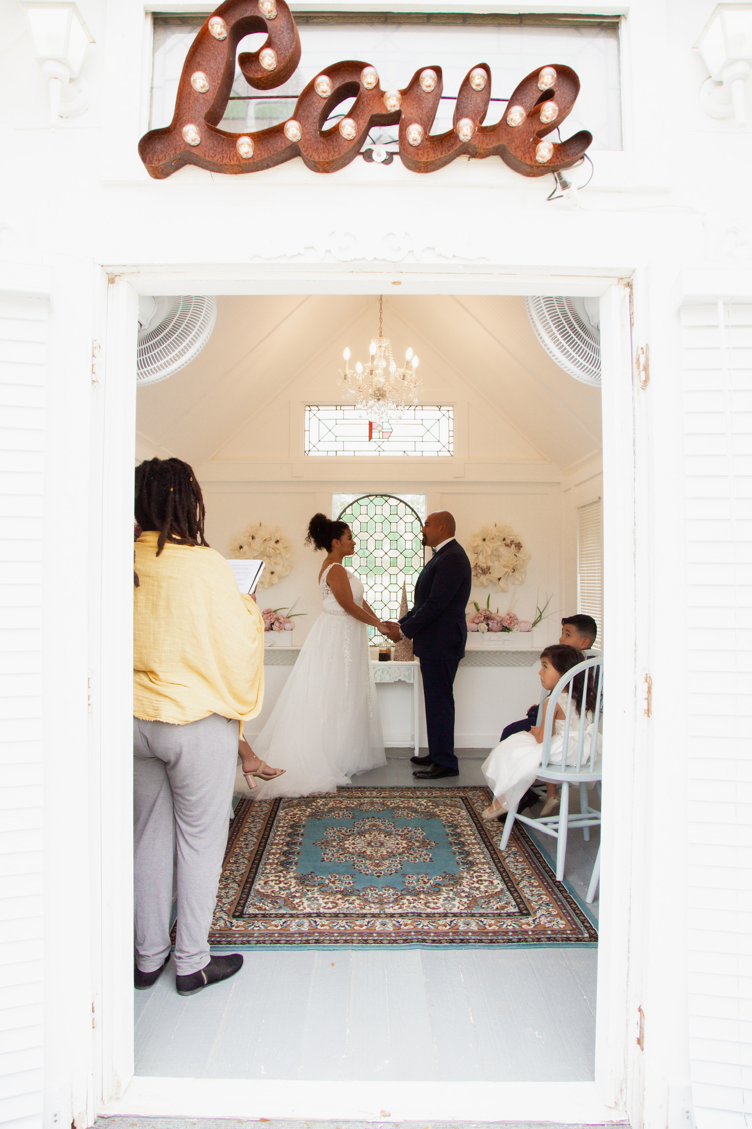 Couple sharing a joyful moment at their intimate wedding ceremony