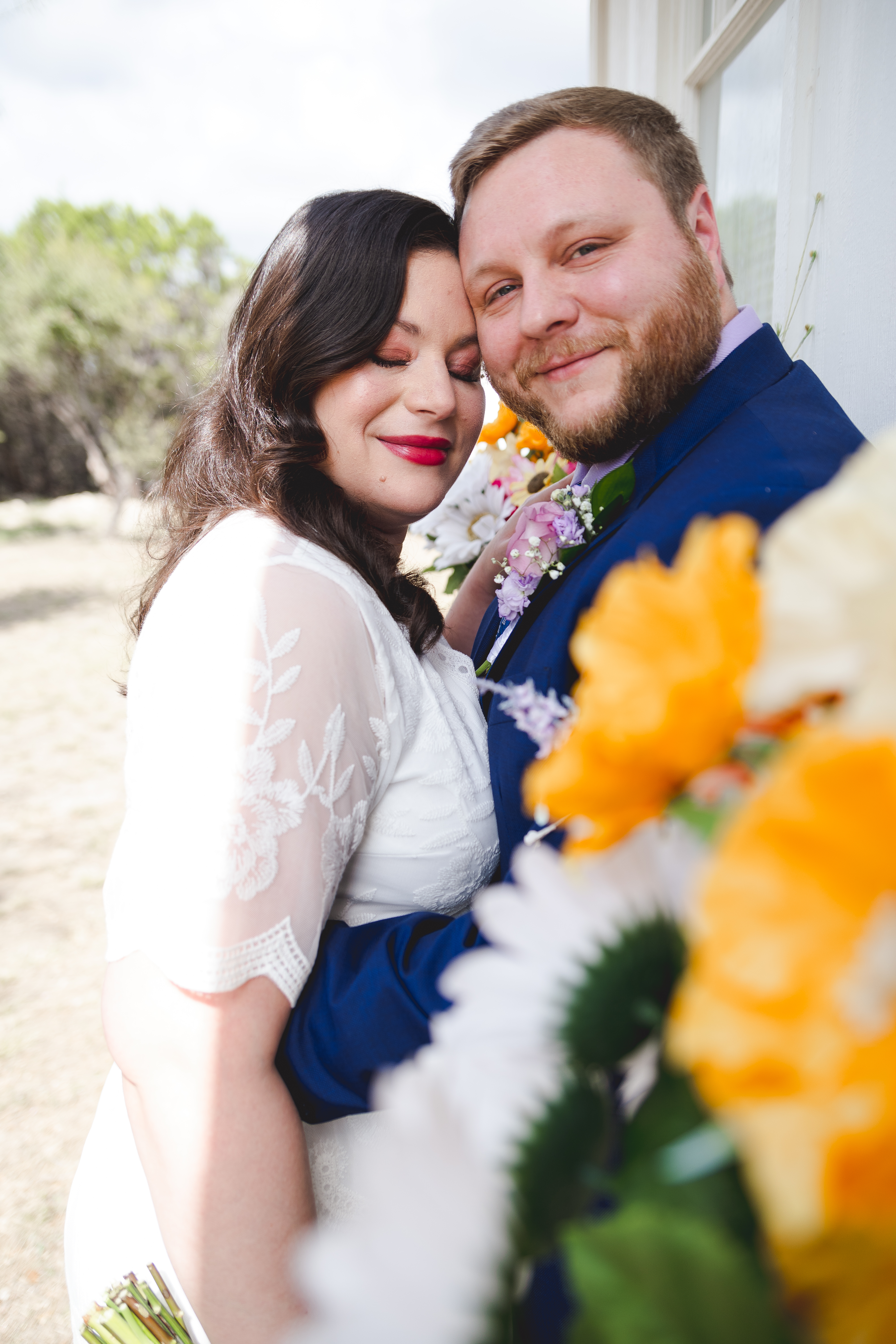 Couple exchanging personalized vows during an intimate elopement ceremony