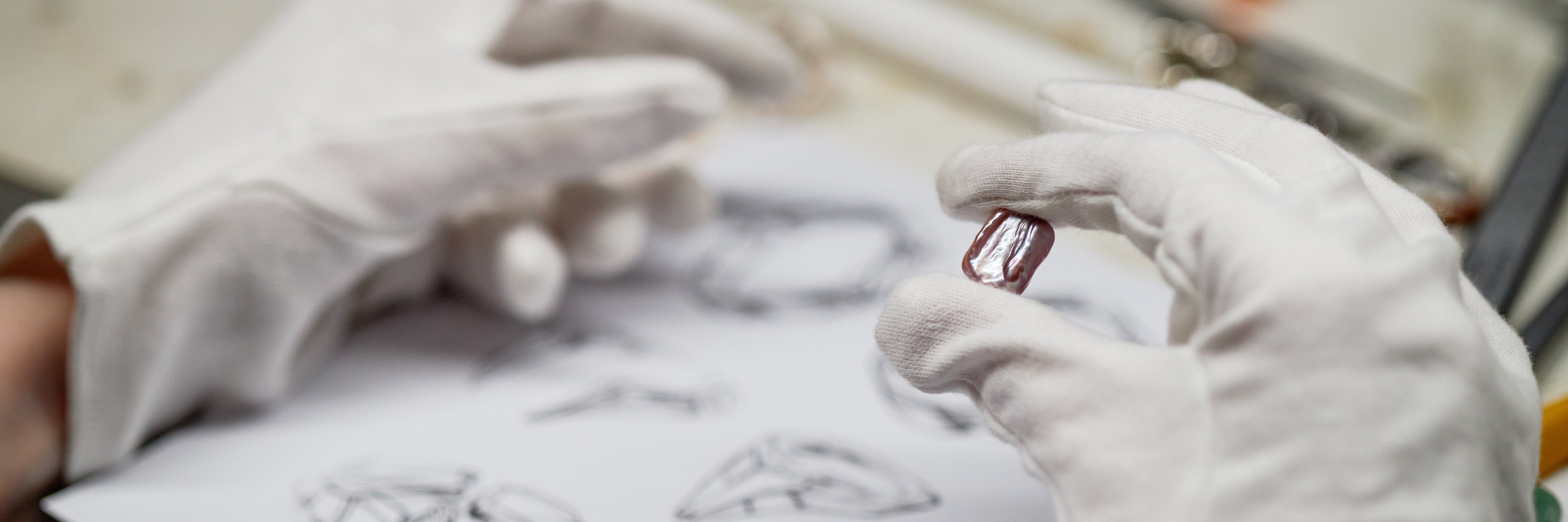 How to Evaluate Plastic Quality for Cost‑Effective Project Outcomes 1 inspecting gemstone with white gloves in workshop 56aeeb10715d7d781769