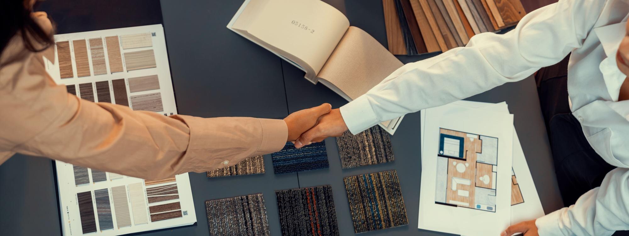 interior designer shake hand with client or collea c7f69af68d7b23d8113f