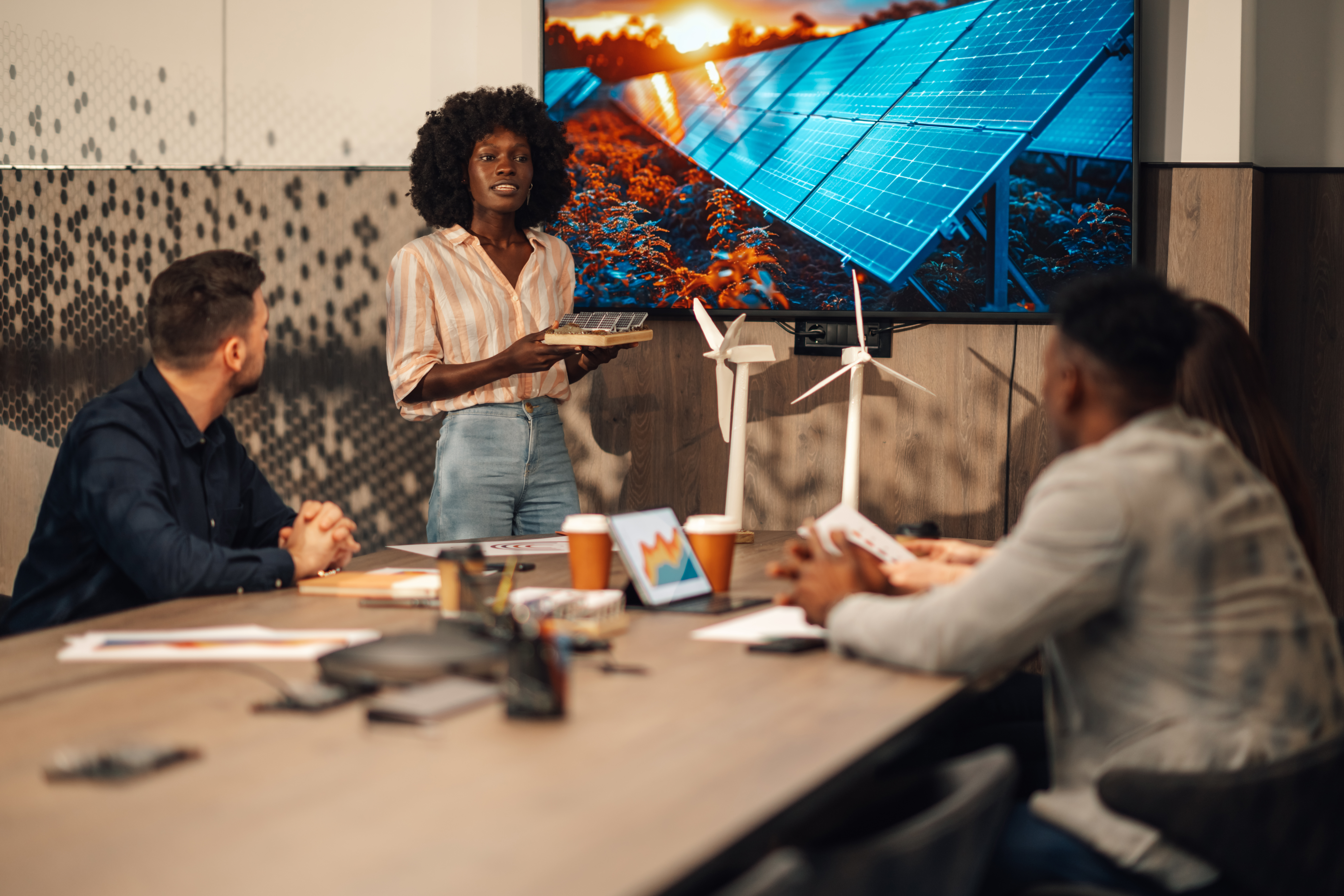 interracial engineer with solar panels having semi ff72fe8f915892e22524