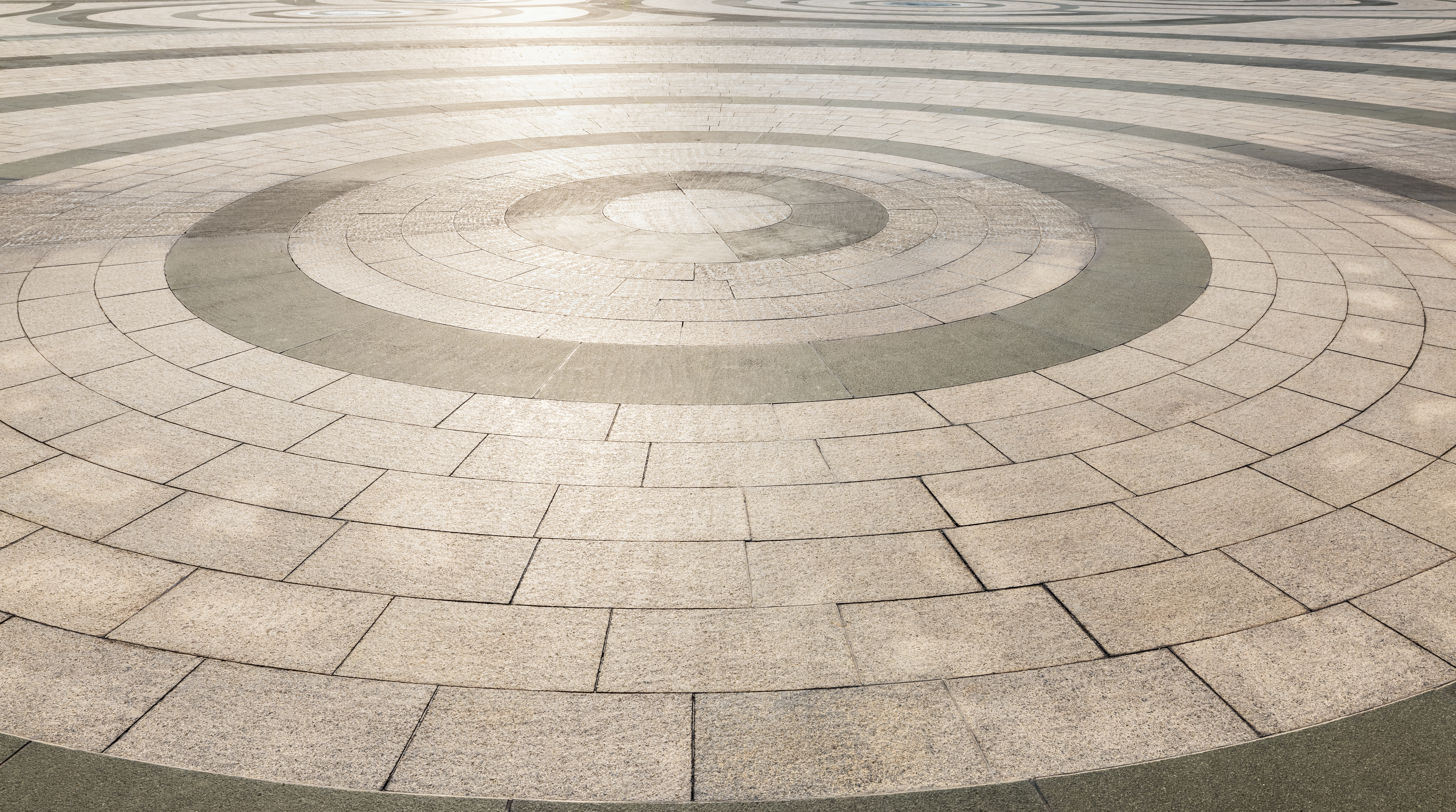 intricate circular paving pattern crafted from sto d022c8c837f705bd8618