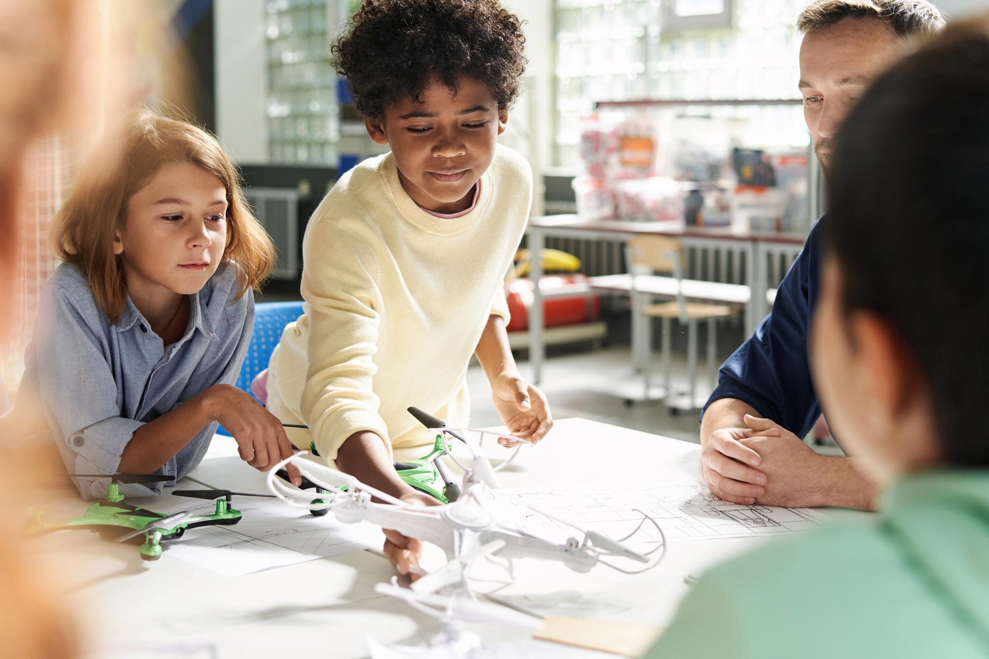 Kid Attending Aeromodeling Class 976d2c24d024a2aa42ff