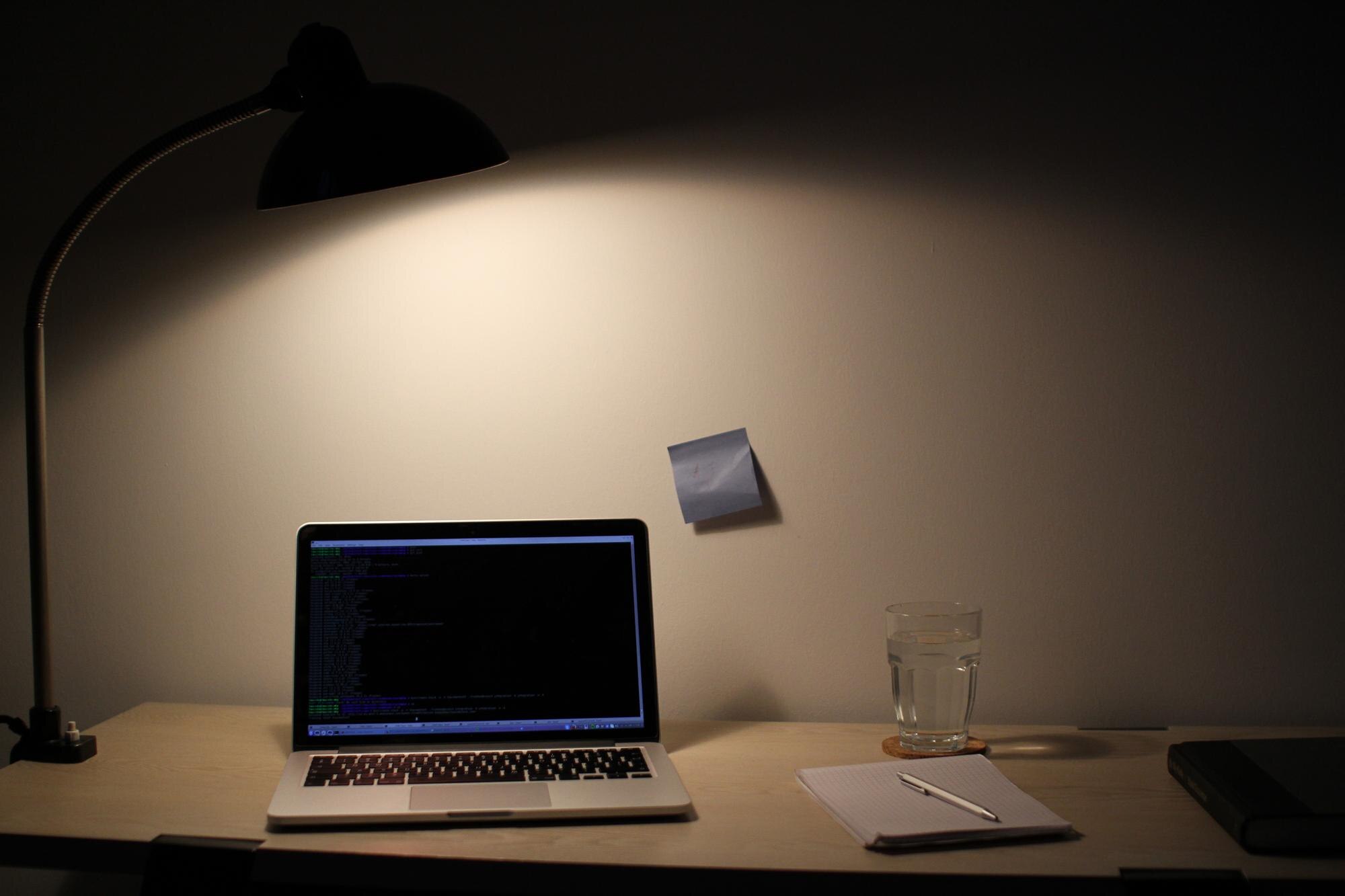 laptop and book on table at home 8b2c3e59649124593dc6