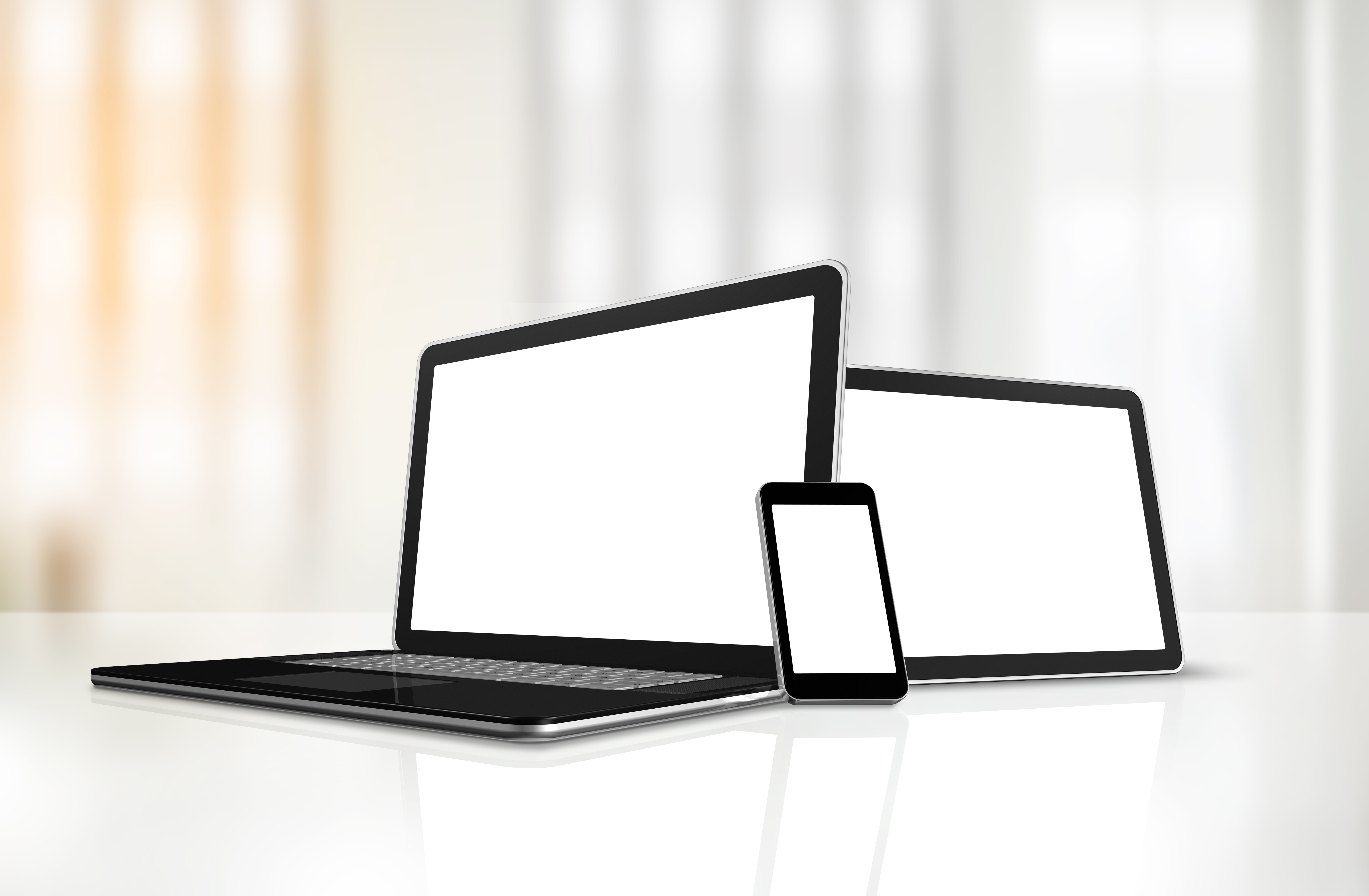 laptop mobile phone and digital tablet pc on offi 8e7abe27aea0dcc0af29 - MedWell Digital Marketing Agency