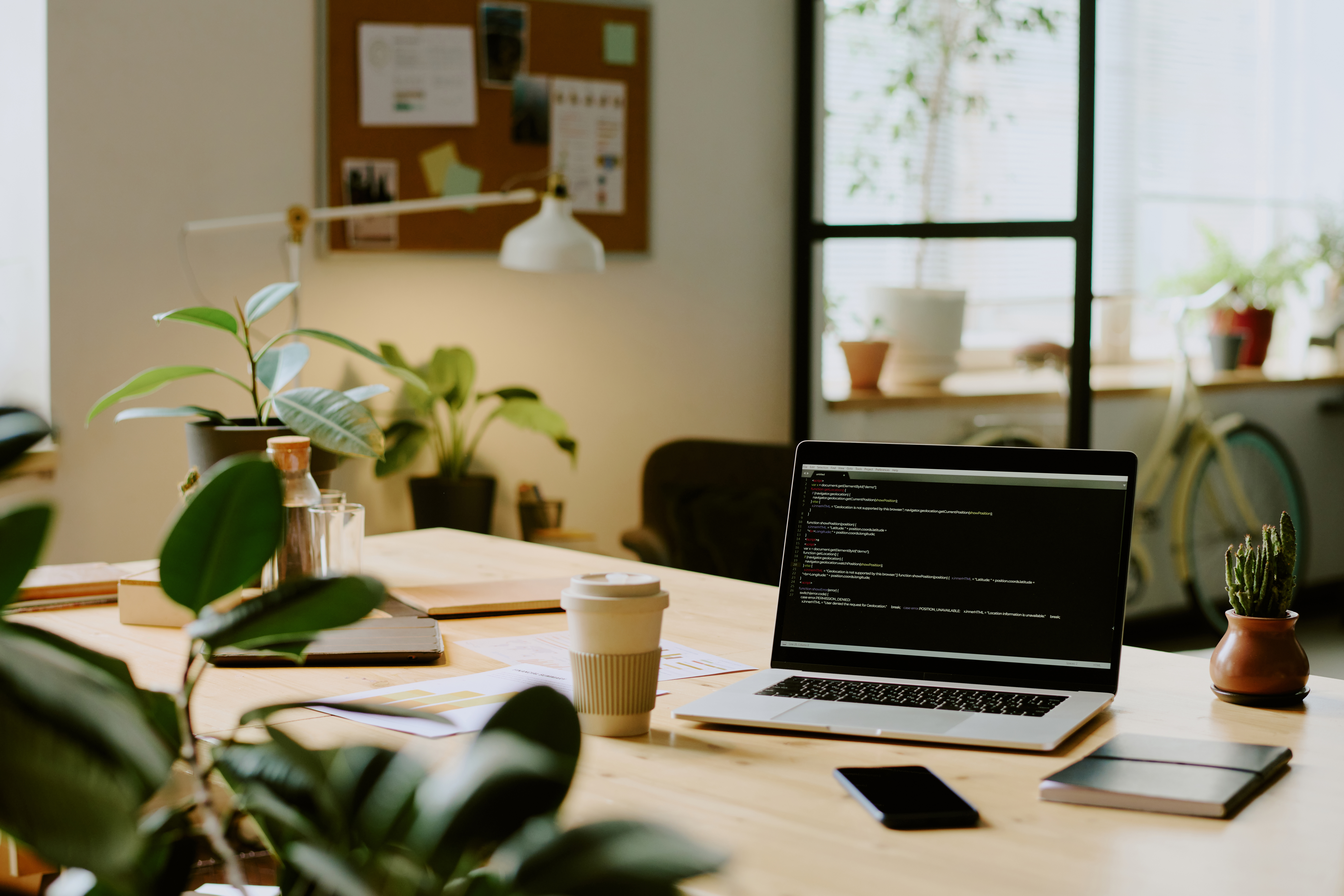 laptop on desk in eco friendly office 666c6b64c5f1547ac417 - MedWell Digital Marketing Agency