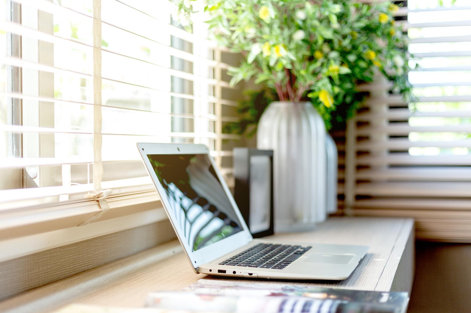 laptop on table at home 53bc39c42a9e968f272e