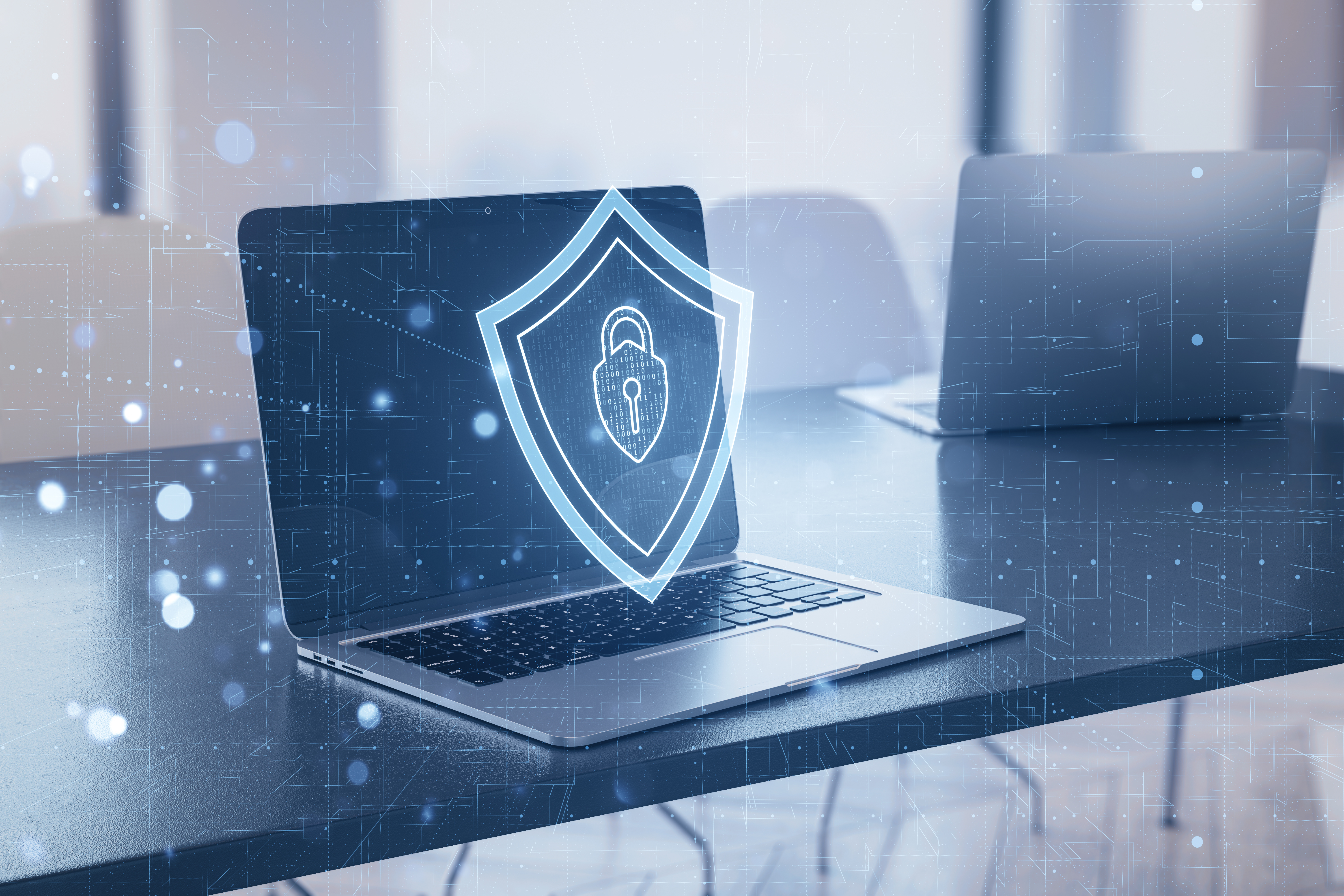 laptop with a digital shield symbol onscreen signi 4c8e6e20bc3f4423d46e