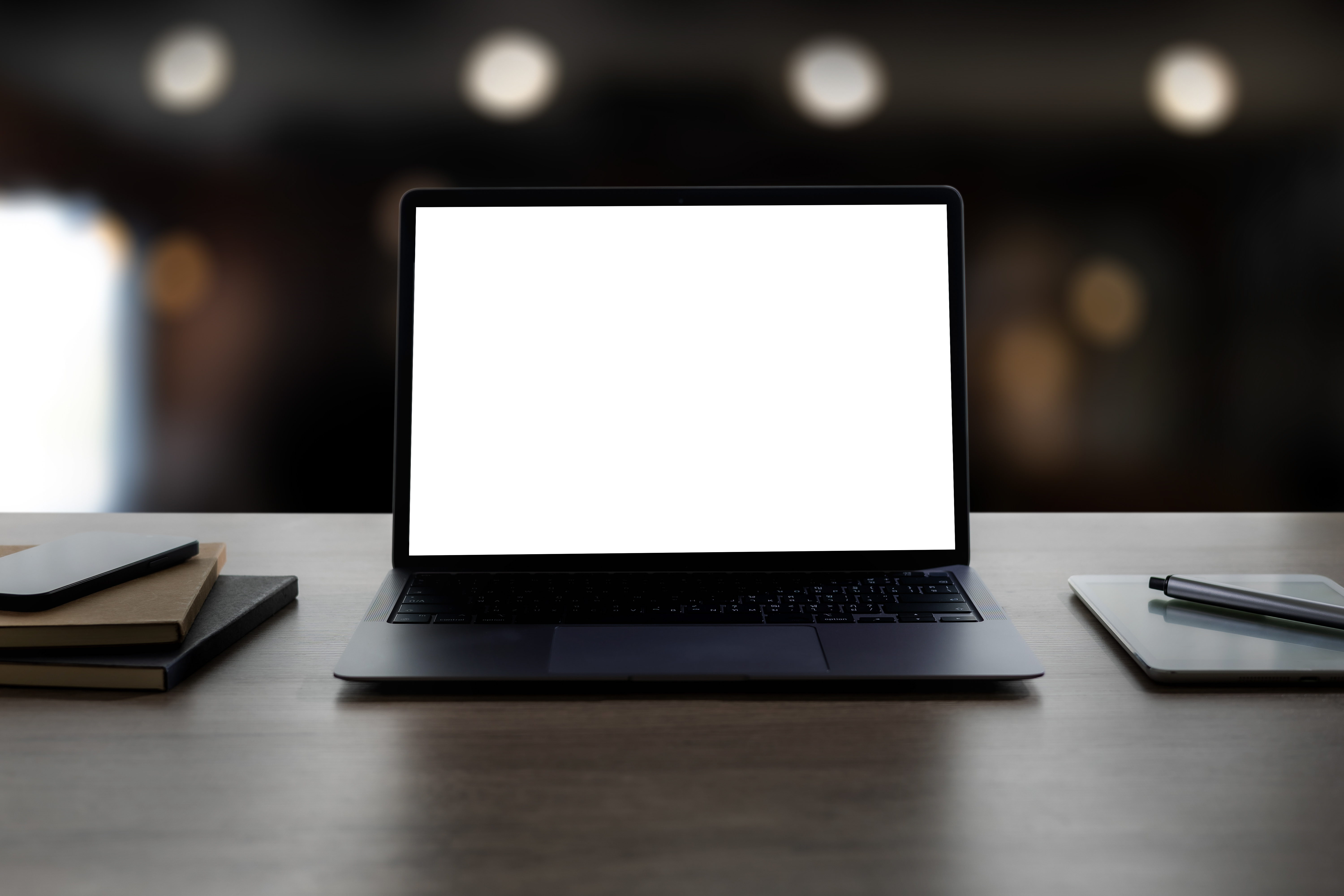 laptop with blank screen on table workspace backg 69acdbaf2b58abba3274